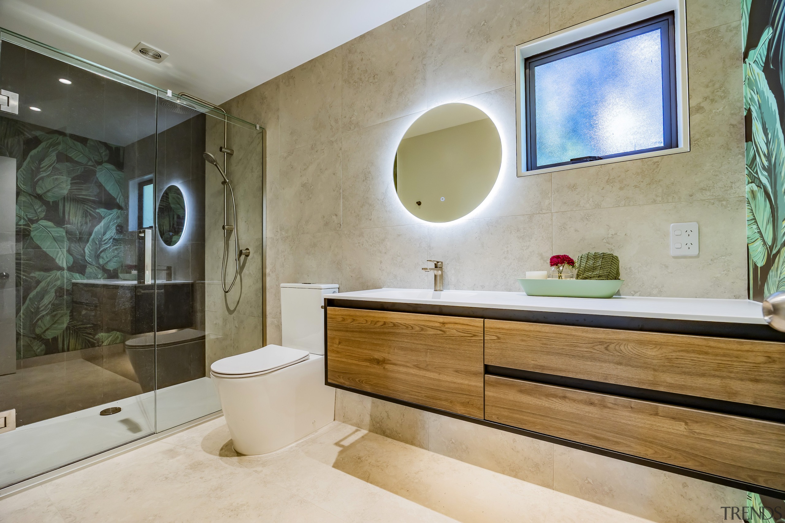 Cantilevering the vanity adds to the bathroom's sense 