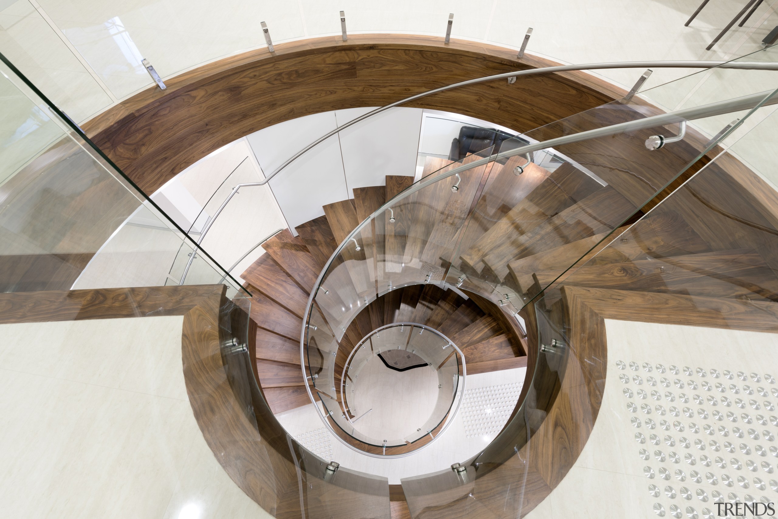 This dramatic staircase features tightly curved glass panels product design, stairs, table, white, brown