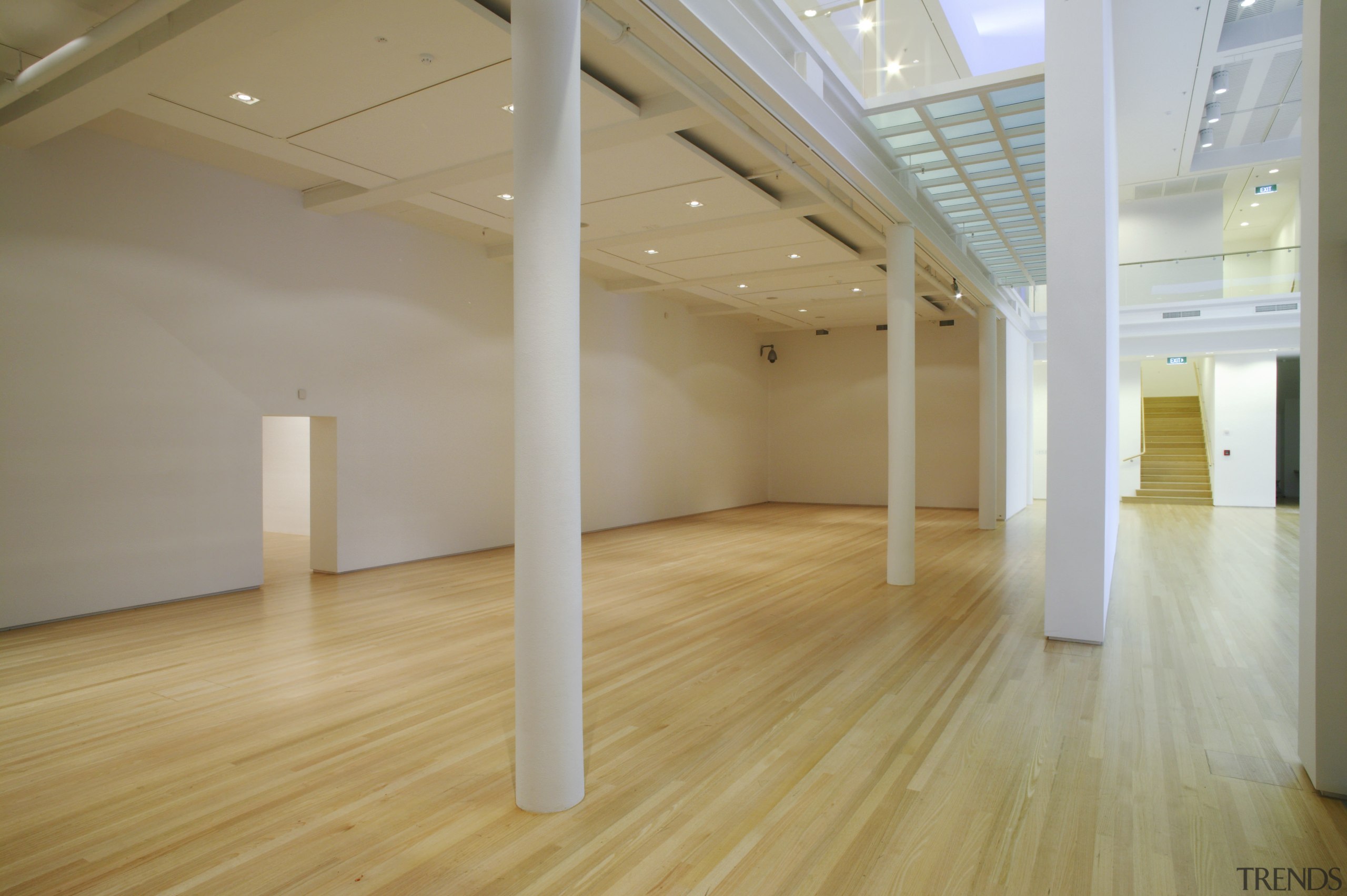 The new tauranga art gallery is located in ceiling, daylighting, floor, flooring, hardwood, interior design, laminate flooring, loft, property, real estate, room, wood, wood flooring, gray, brown