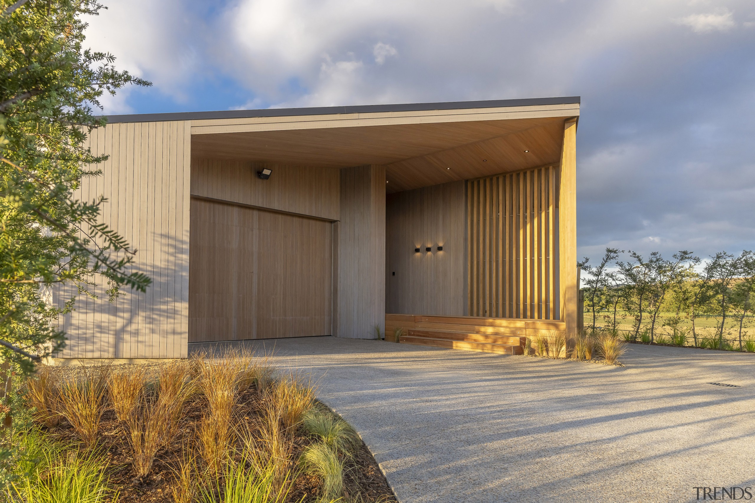 Sculptural garage and approach. - Follow the river 