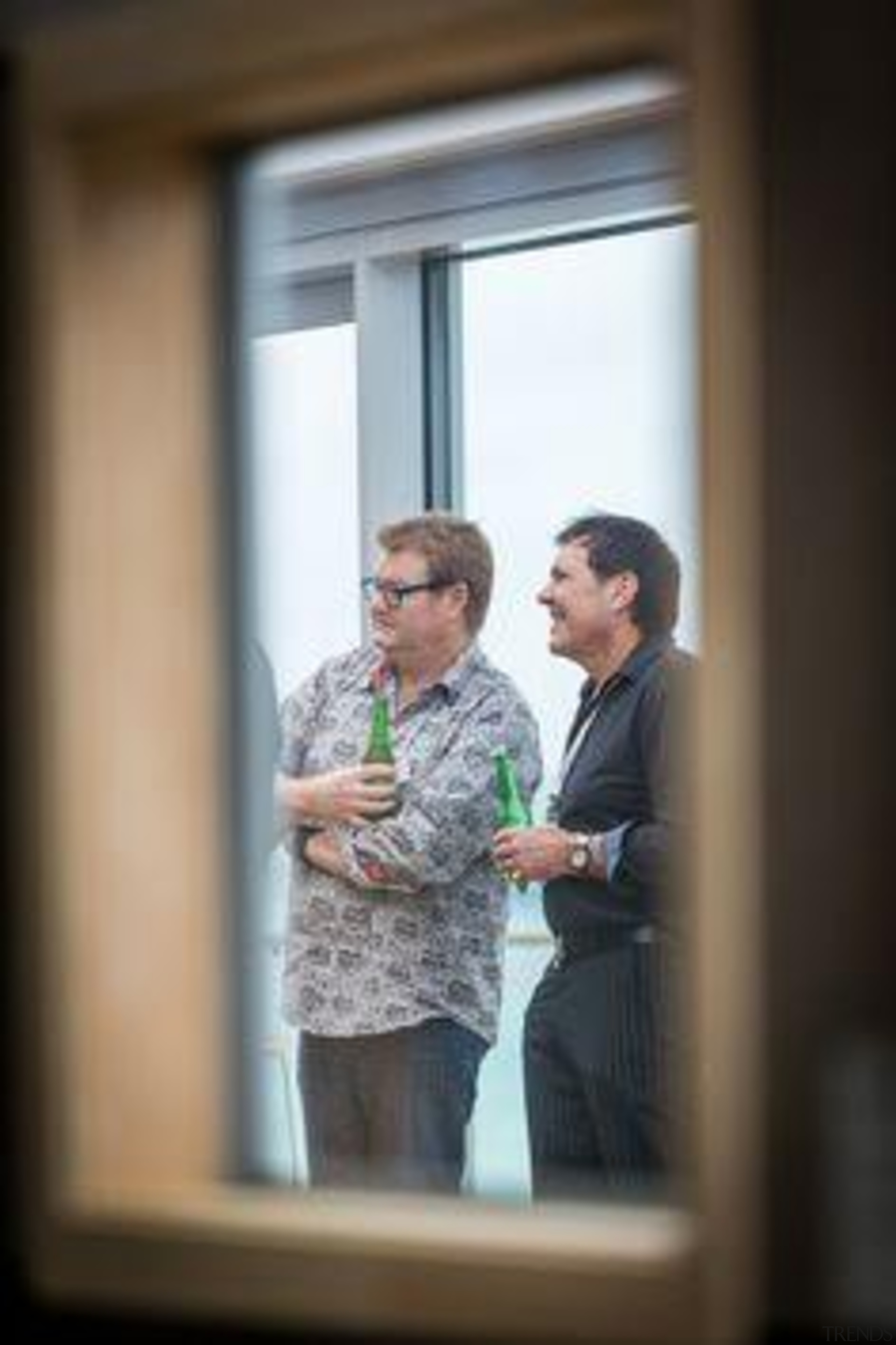 Mal Corboy with Murray Christensen, at The Cloud. photograph, window, black