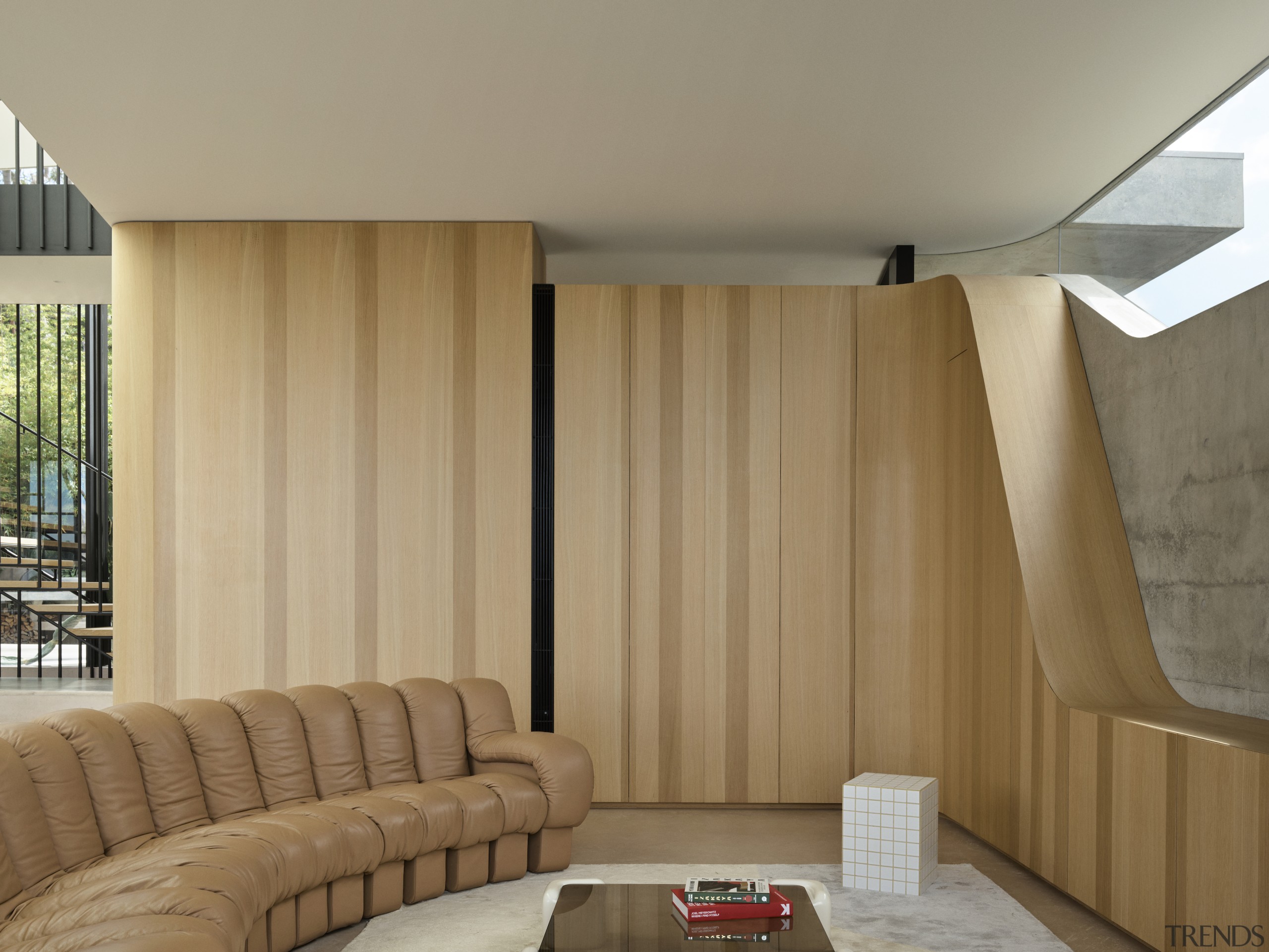 The sofa tones with the wood finishes which 