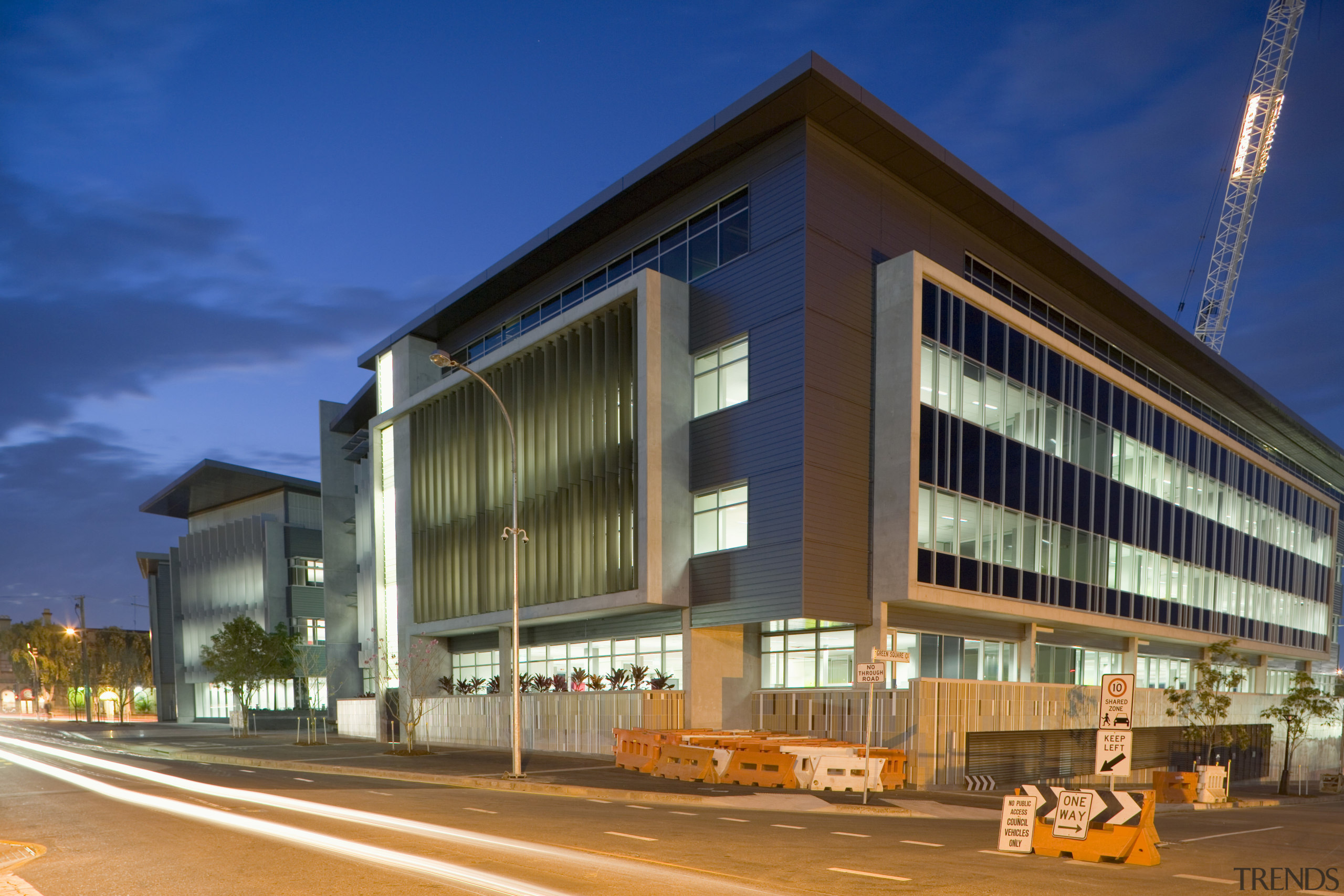 An exterior view of the Greensquare officle tower apartment, architecture, building, commercial building, condominium, corporate headquarters, facade, headquarters, metropolitan area, mixed use, property, real estate, residential area, sky, blue