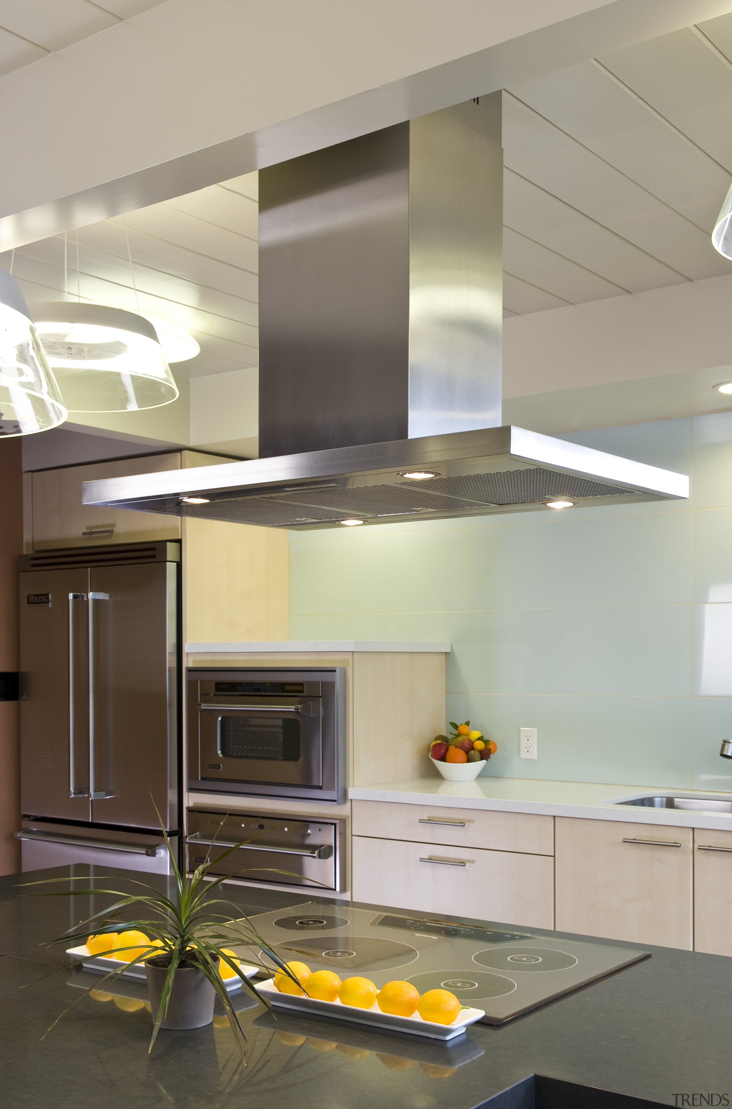 View of contemporary kitchen, range hood and cooktop cabinetry, ceiling, countertop, daylighting, interior design, kitchen, light fixture, lighting, under cabinet lighting, gray