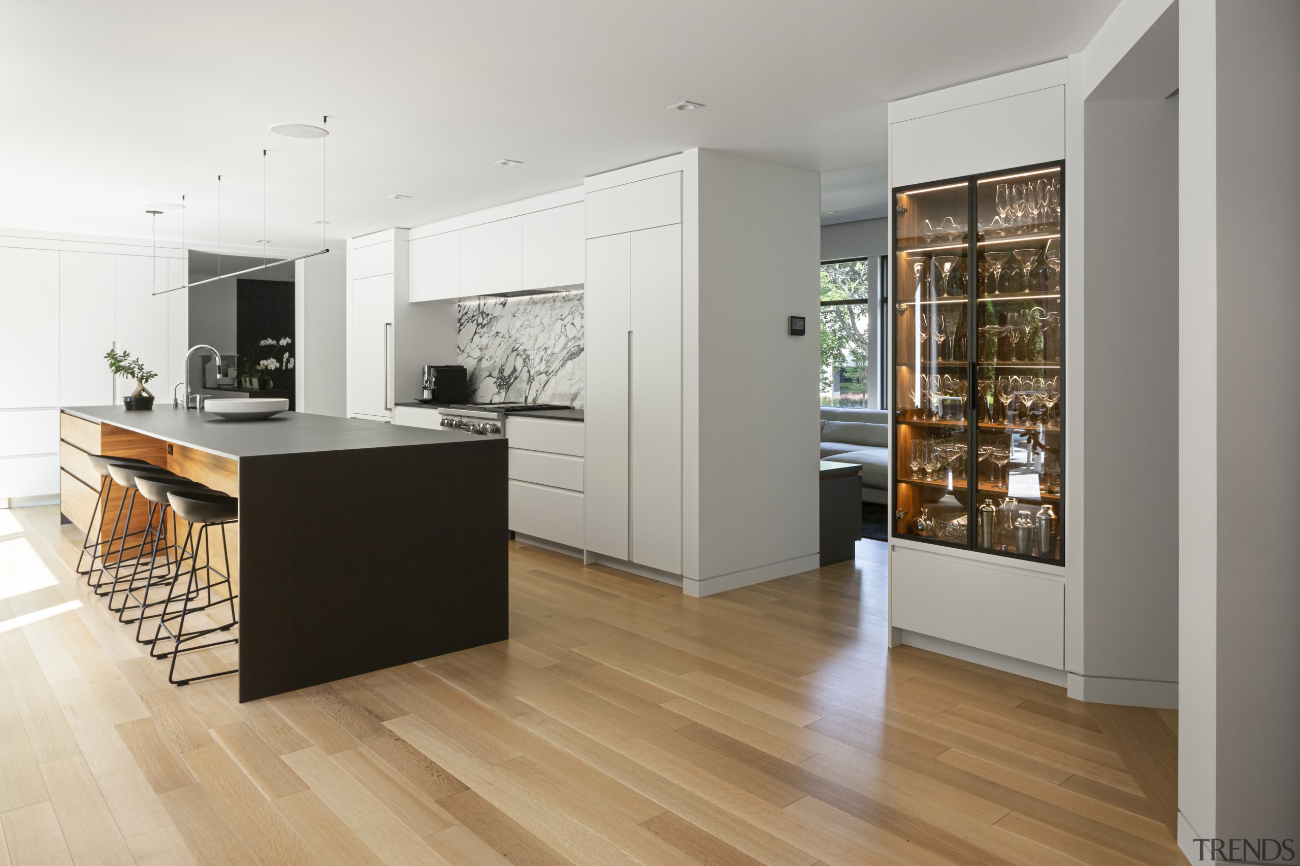 The substantial kitchen island is accompanied by a 