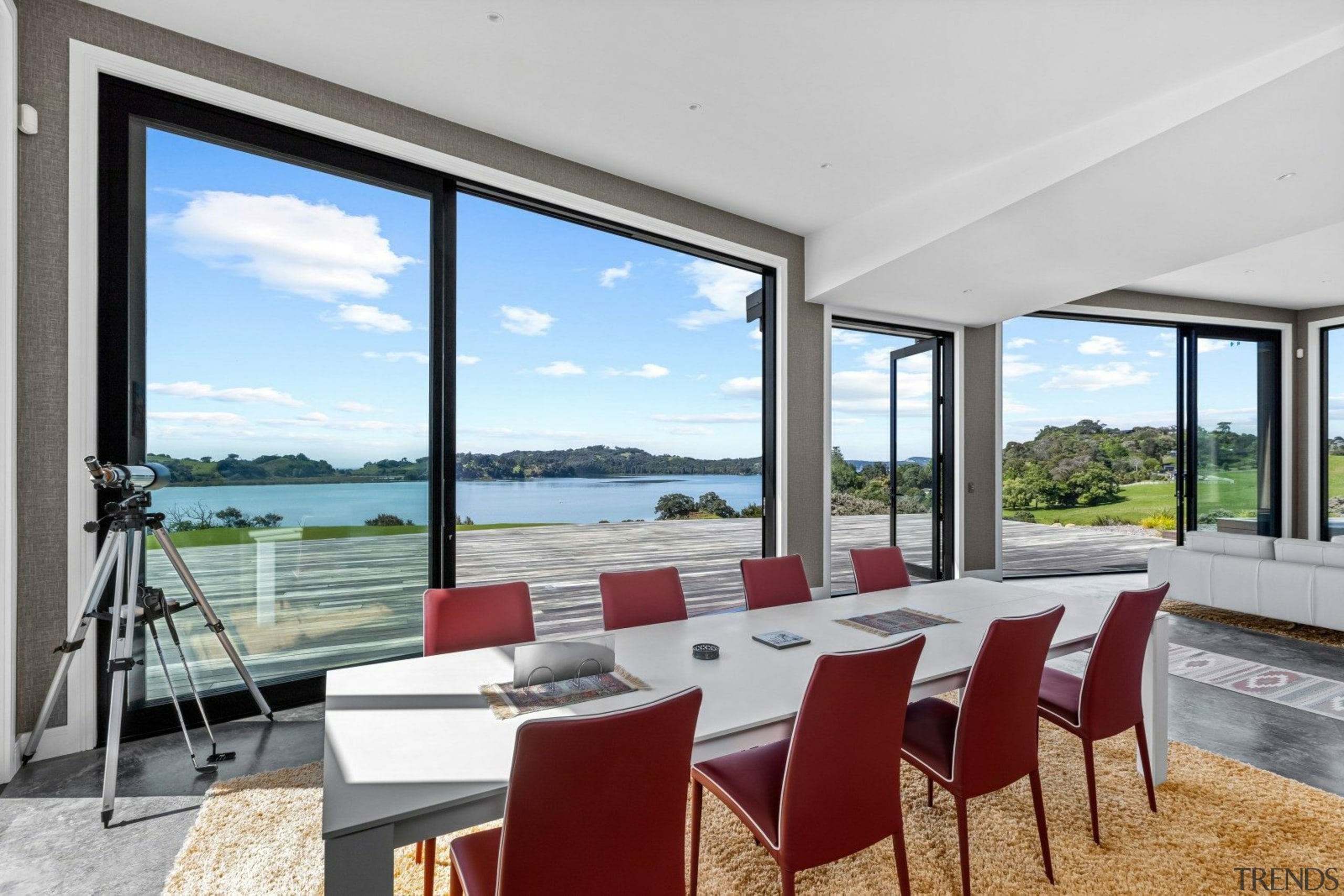 Giant wall-high sliders take in the views. - 
