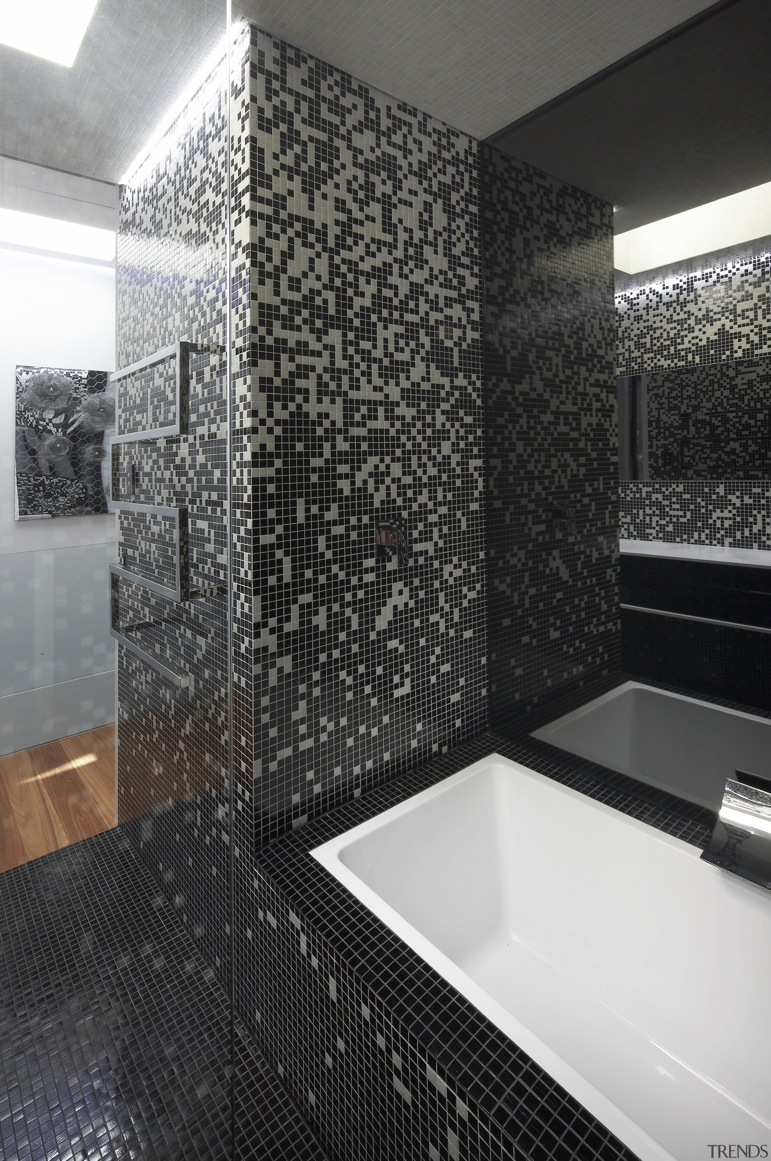 The black and white mosaic pattern in this architecture, bathroom, daylighting, floor, flooring, glass, interior design, room, tile, wall, black, gray