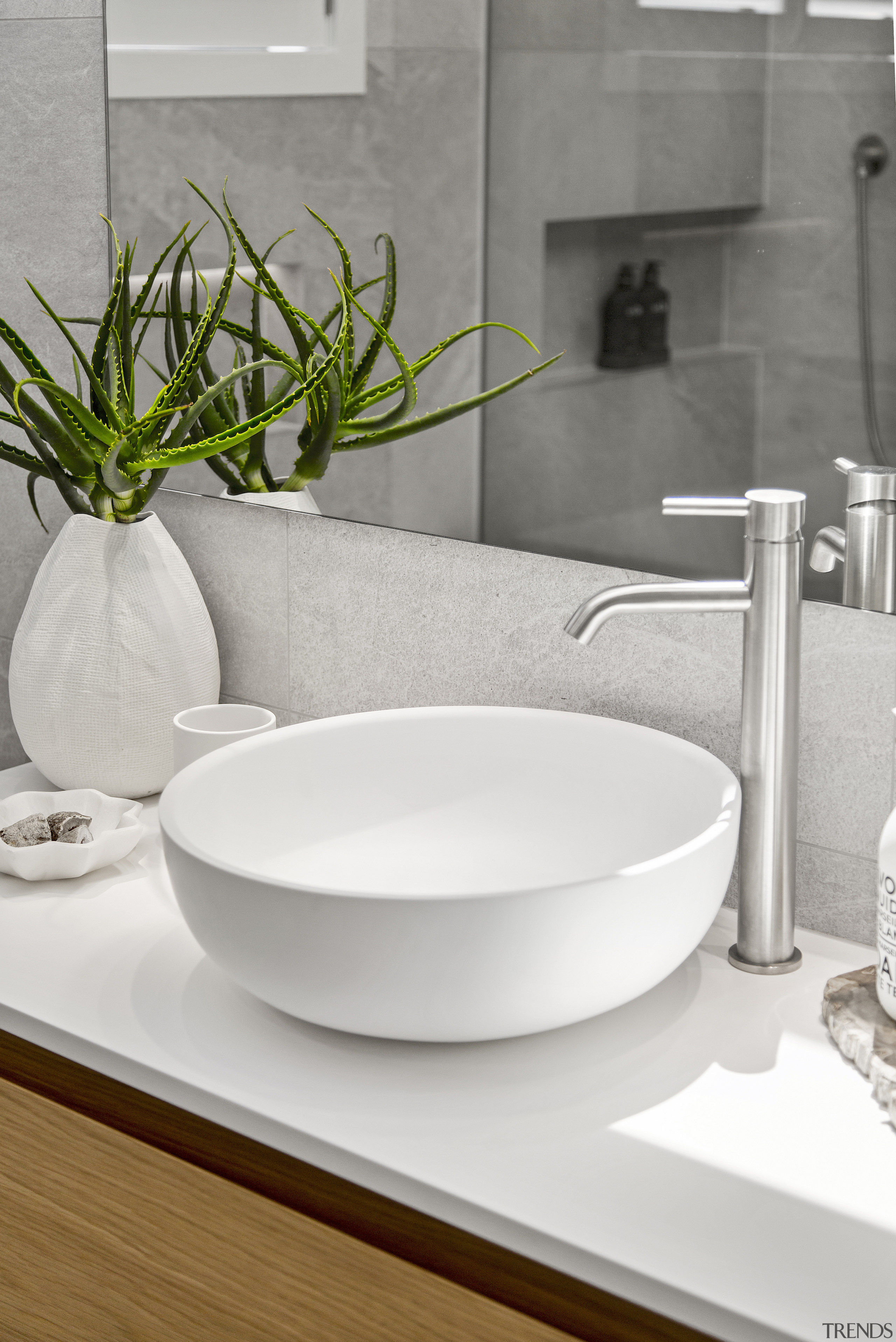 Shapely chrome tapware adds another designer touch to 