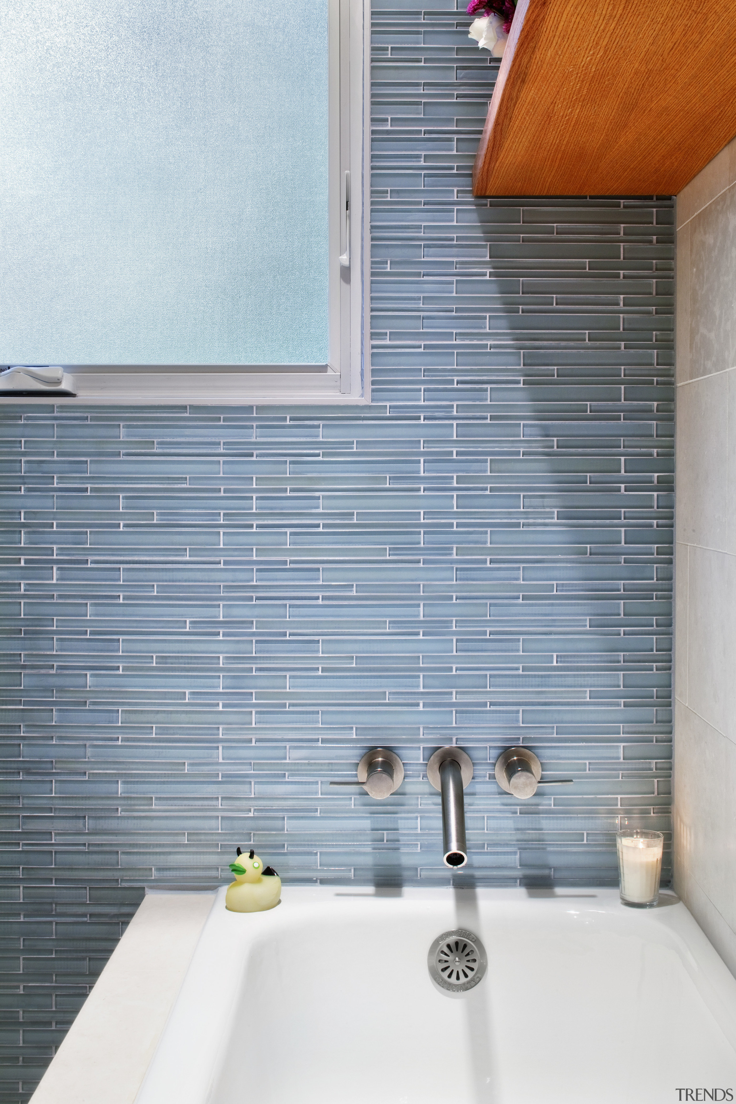 View of bathroom with blue wall, contemporary rectangular bathroom, daylighting, floor, flooring, interior design, plumbing fixture, room, sink, tap, tile, wall, gray