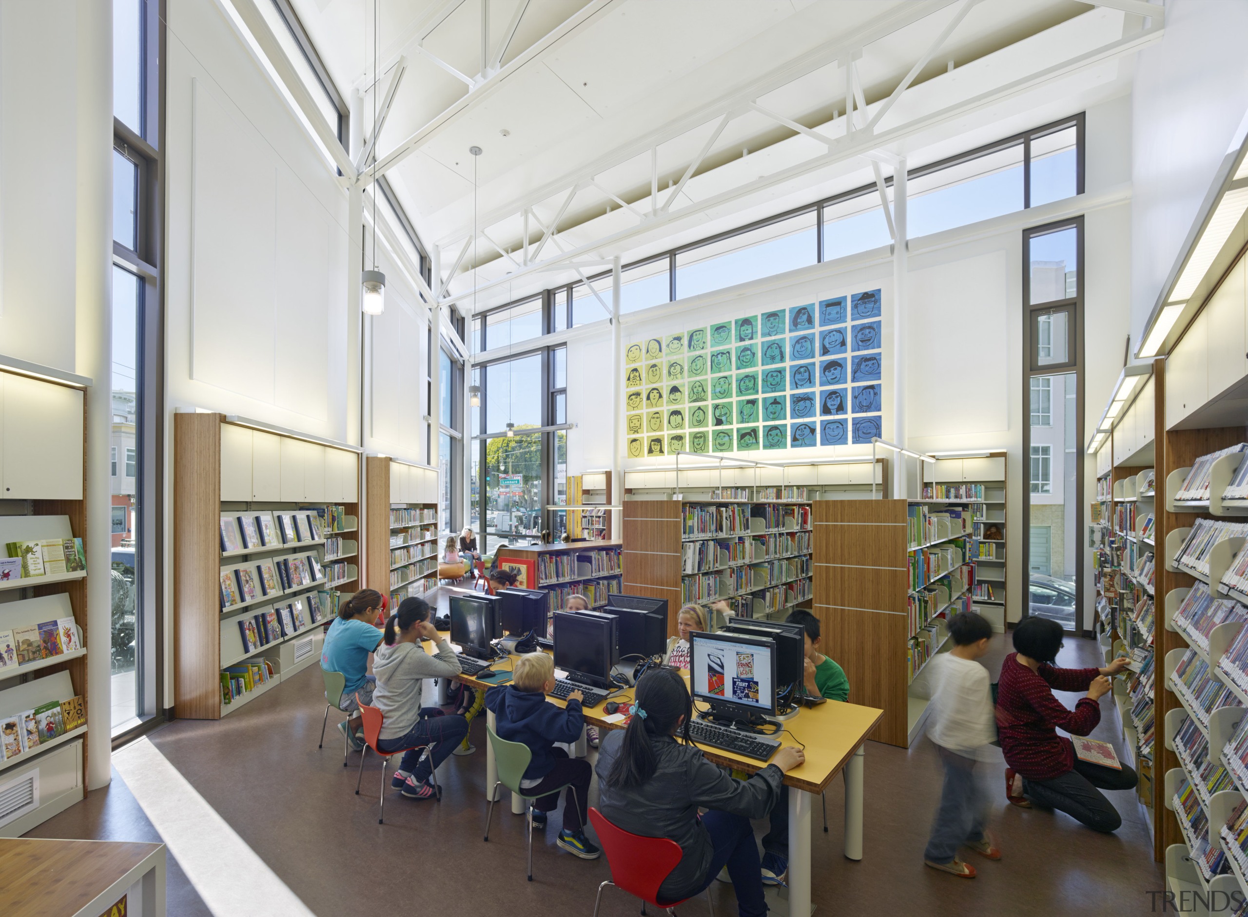 Soaring double-height ceilings in the childrens reading room classroom, daylighting, institution, library, library science, public library, white