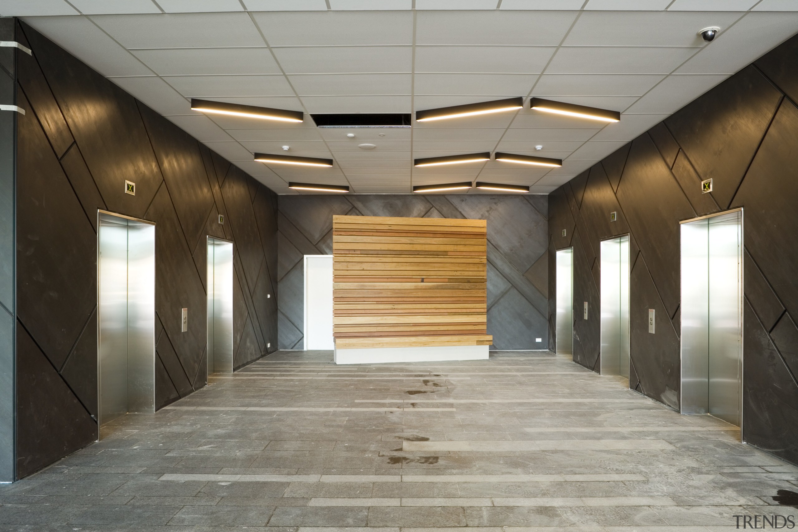 A view of the lobby featuring reconstituted timber ceiling, floor, flooring, interior design, lobby, gray