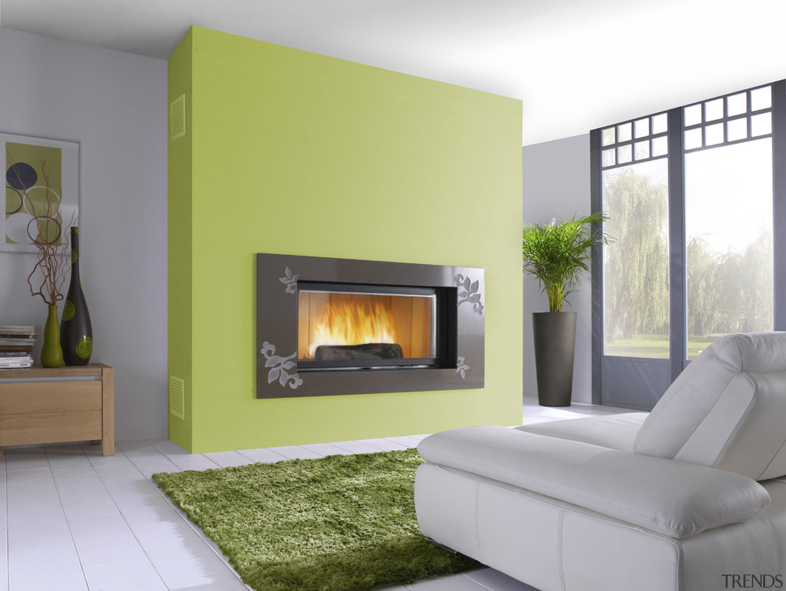 View of fireplace on green feature wall. - fireplace, hearth, home, interior design, living room, wood burning stove, gray