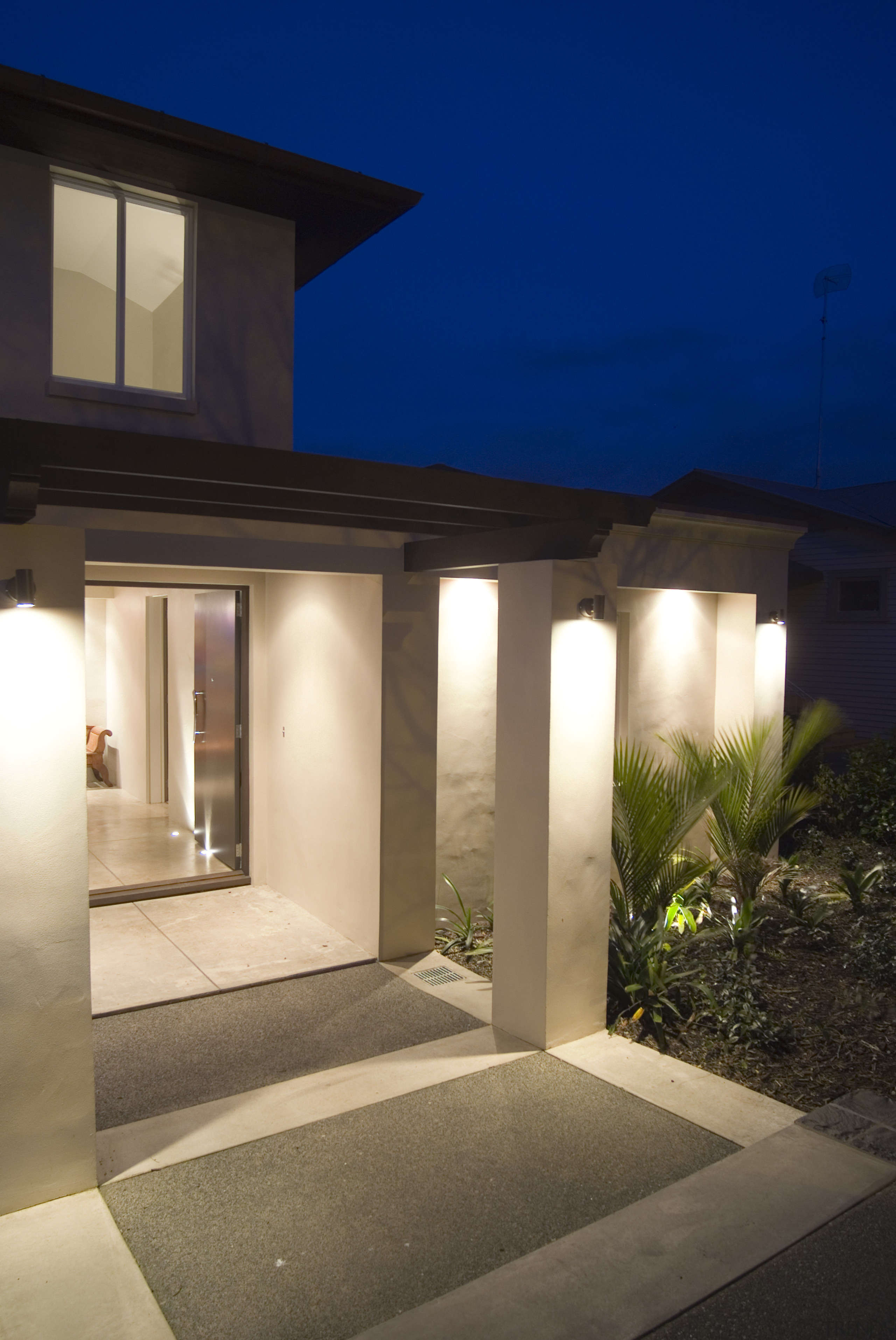 Squares of exposed aggregate were surrounded with bands architecture, daylighting, estate, facade, home, house, lighting, property, real estate, residential area, sky, window, brown, blue