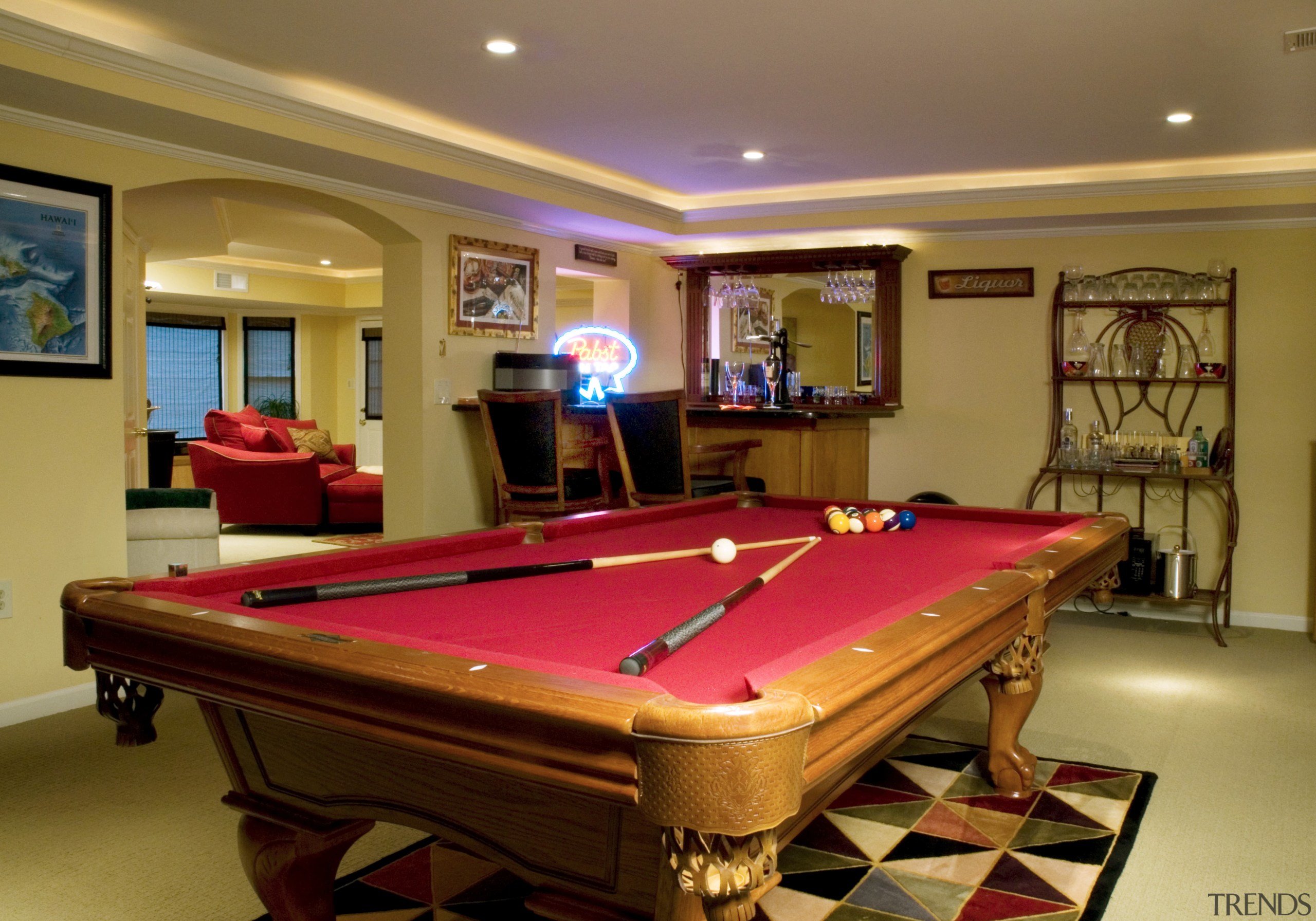 View of basement entertainment area featuring pool table billiard room, billiard table, cue sports, english billiards, estate, furniture, home, interior design, pool, real estate, recreation room, room, table, brown