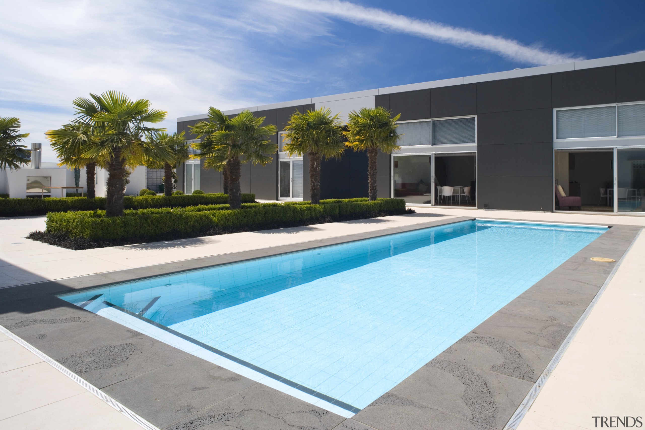 An exterior view of the pool area, pavers, area, estate, home, house, leisure, property, real estate, residential area, resort, swimming pool, villa, white, teal