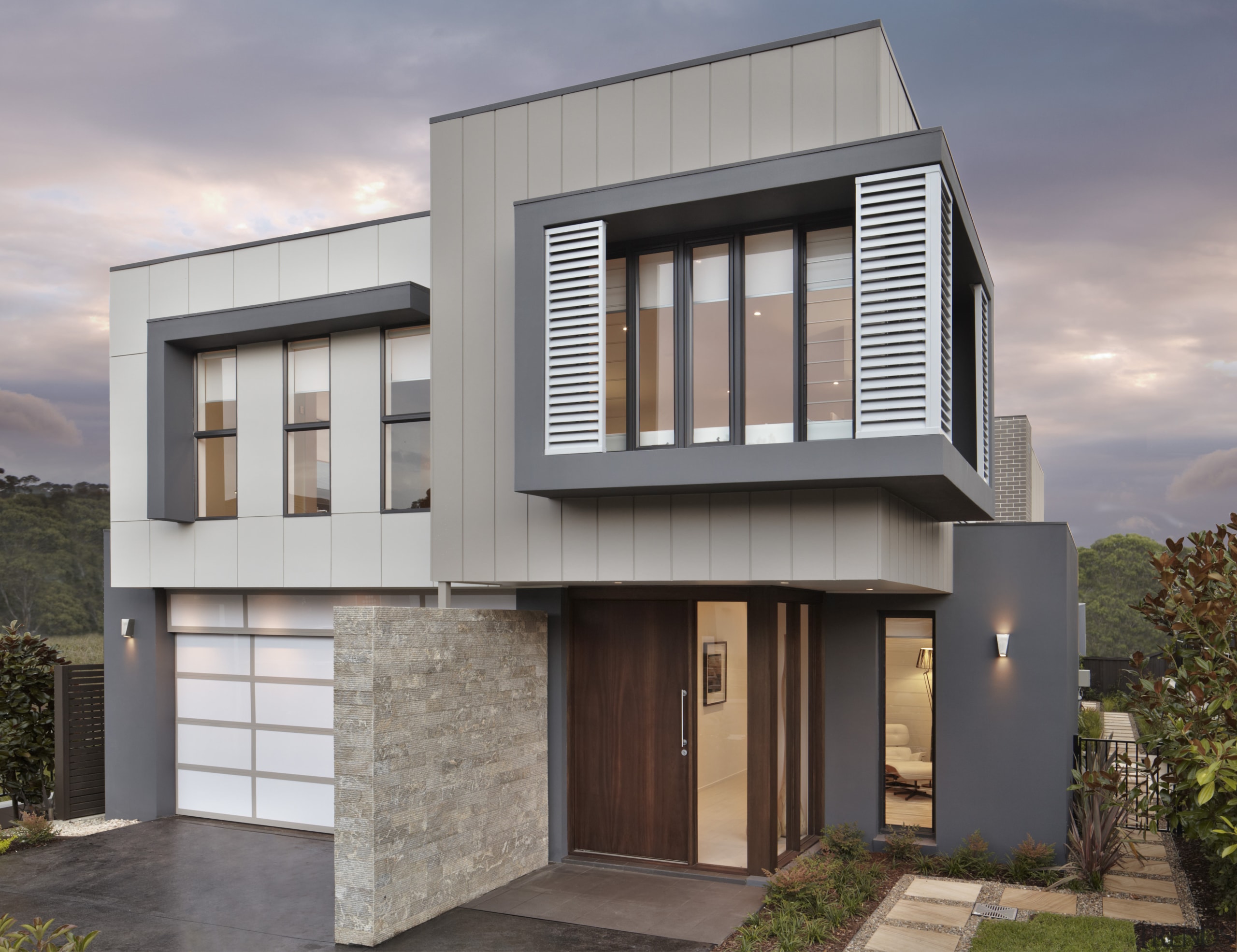 Front door with grey exterior and white shutters. architecture, building, elevation, facade, home, house, property, real estate, residential area, siding, window, gray