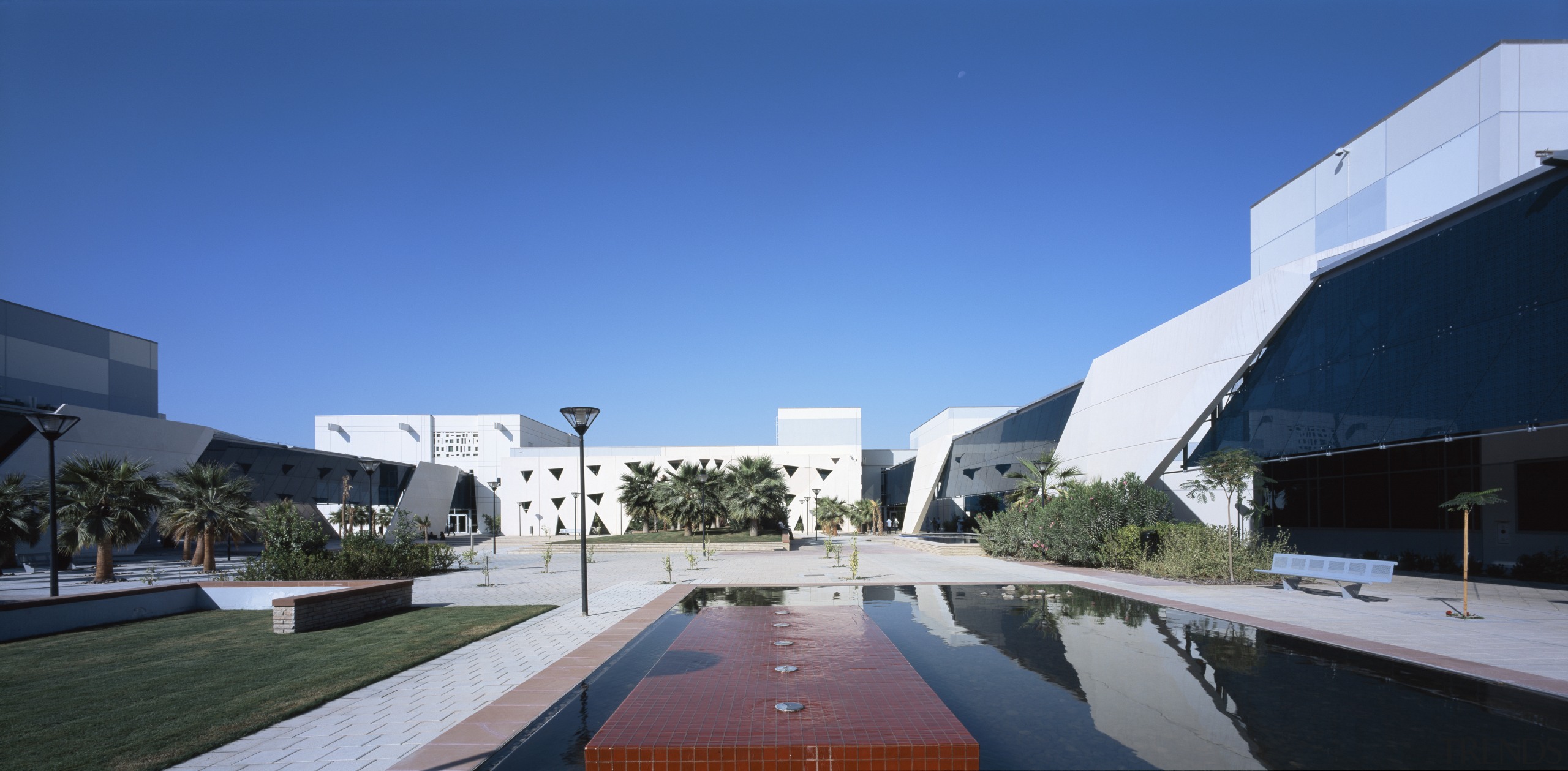 The College of the North Atlantic in Qatar architecture, condominium, corporate headquarters, estate, hotel, house, leisure, mixed use, property, real estate, residential area, resort, sky, swimming pool, blue