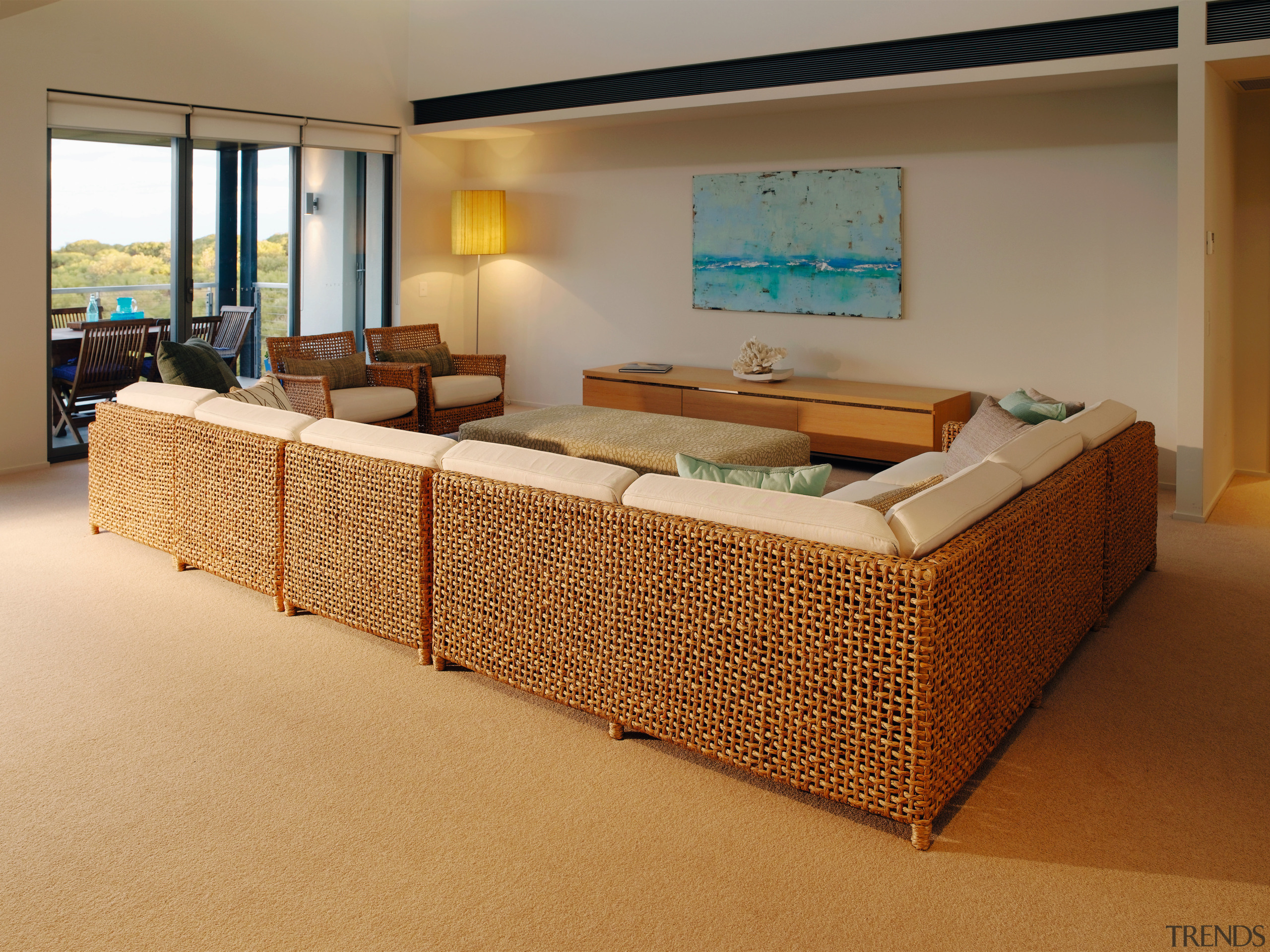 A view of the interior of this magenta floor, flooring, furniture, interior design, real estate, room, brown, orange