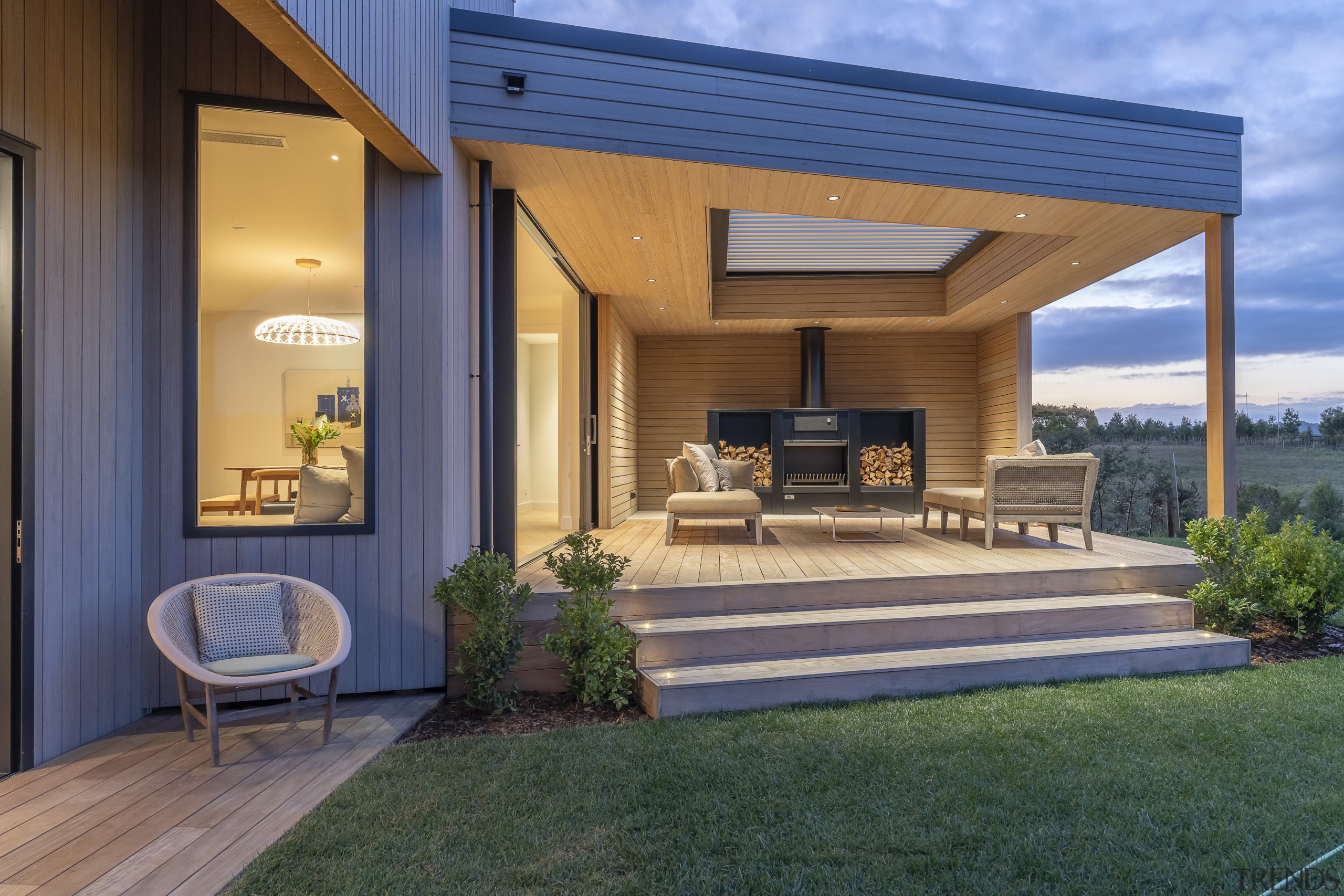 Generous sheltered outdoor living space with roof and 