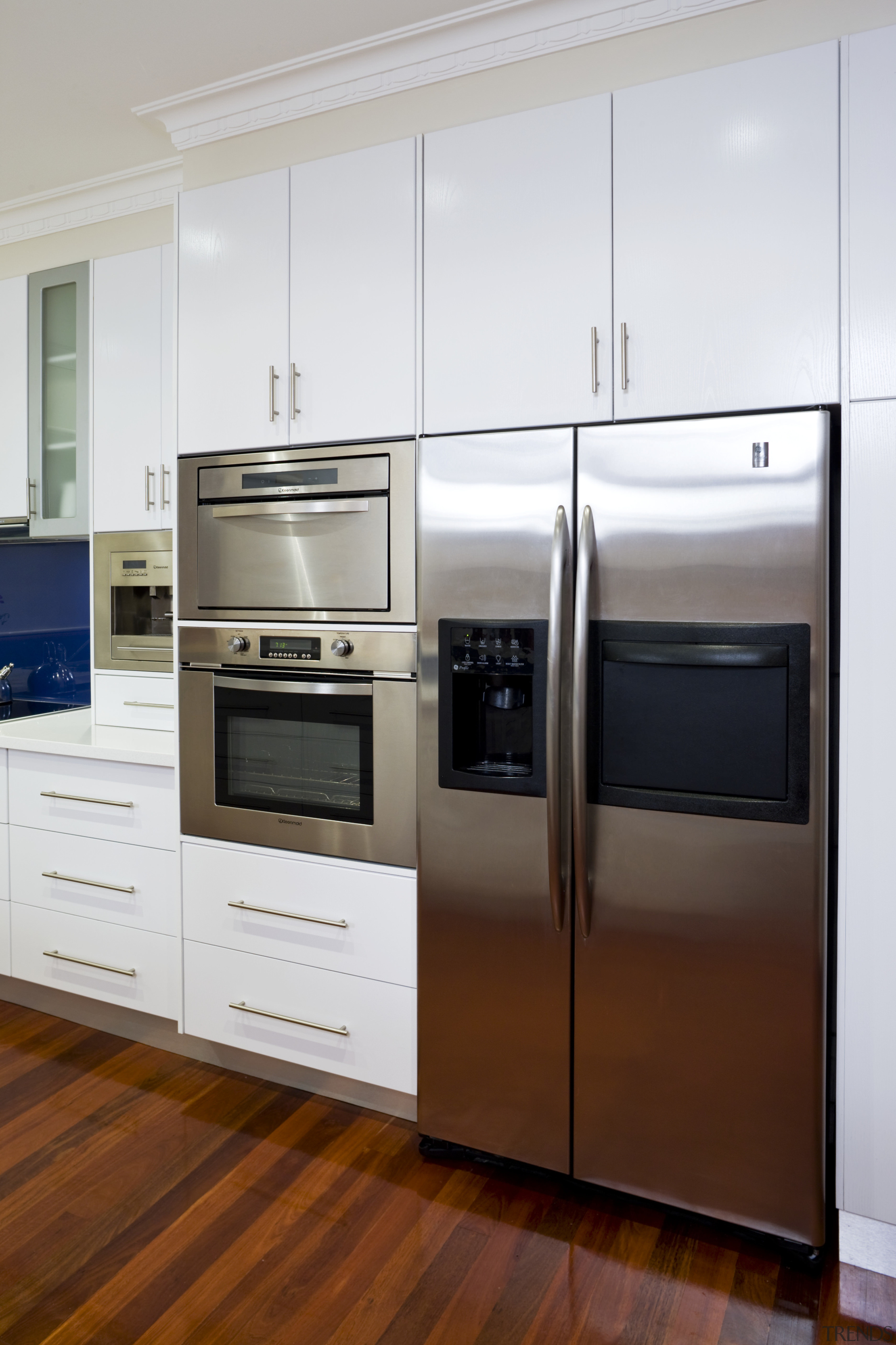 This kitchen incorporates the Kleenmaid steam oven and cabinetry, countertop, home appliance, kitchen, kitchen appliance, kitchen stove, major appliance, refrigerator, white, brown