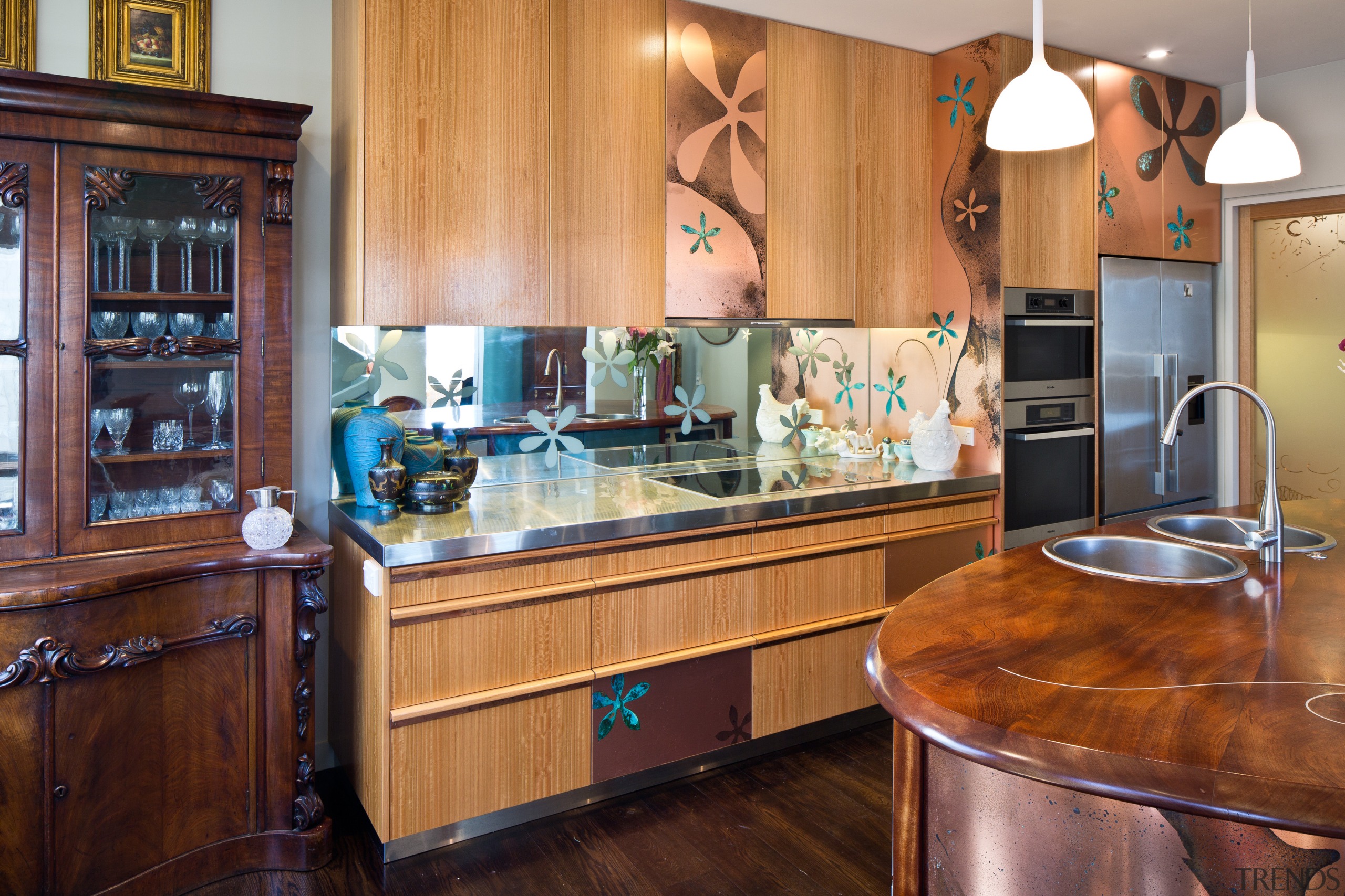 A Pacifica floral motif is continued from the cabinetry, countertop, cuisine classique, hardwood, home, interior design, kitchen, real estate, room