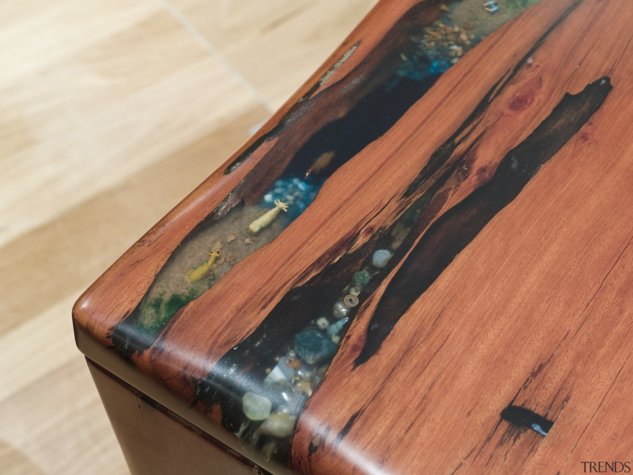 View of a table created by Ironwood Antique hardwood, wood, wood stain, red, orange