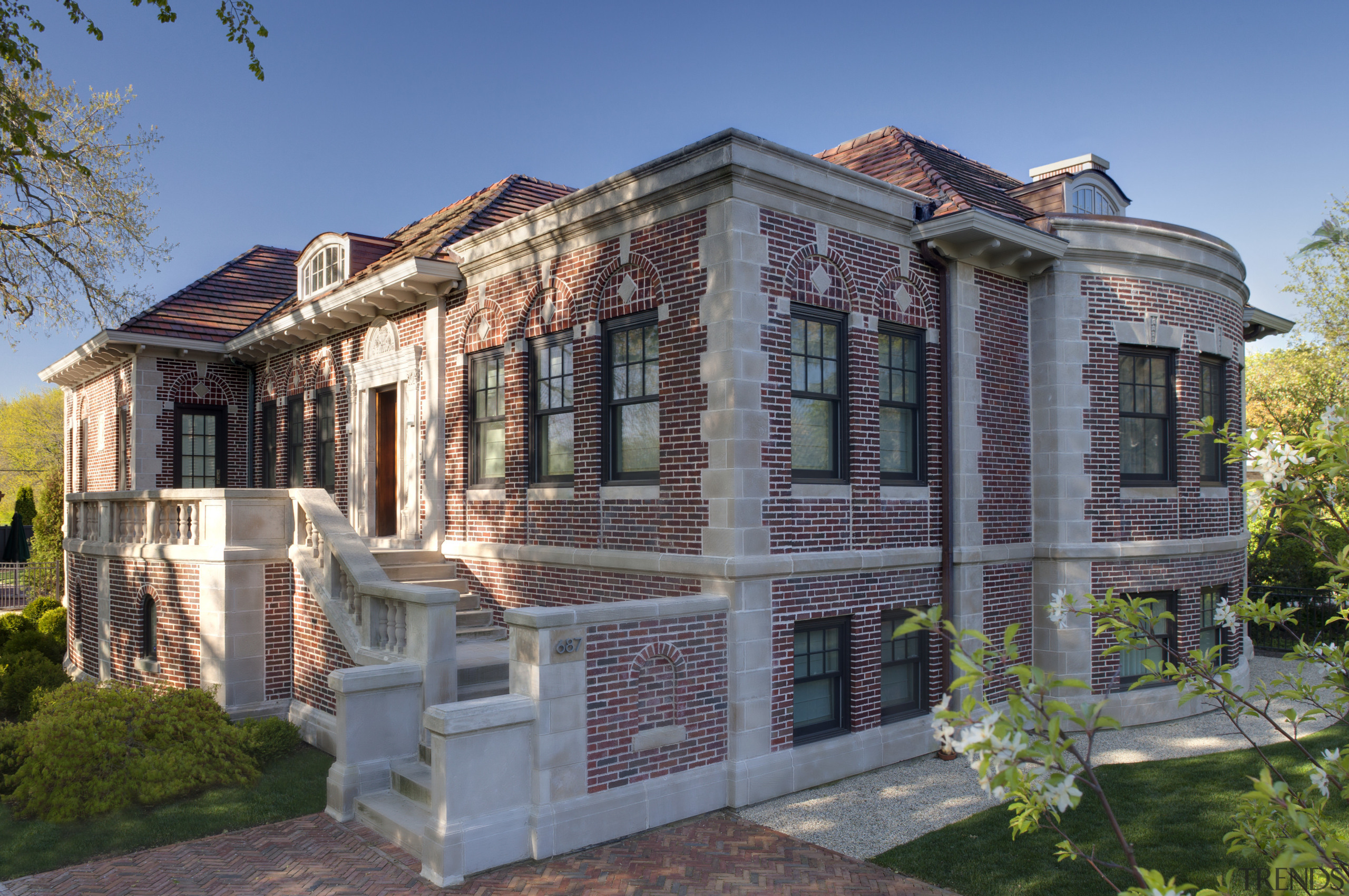 In this remodel by architect William Massey, the building, cottage, elevation, estate, facade, historic house, home, house, mansion, property, real estate, residential area, gray