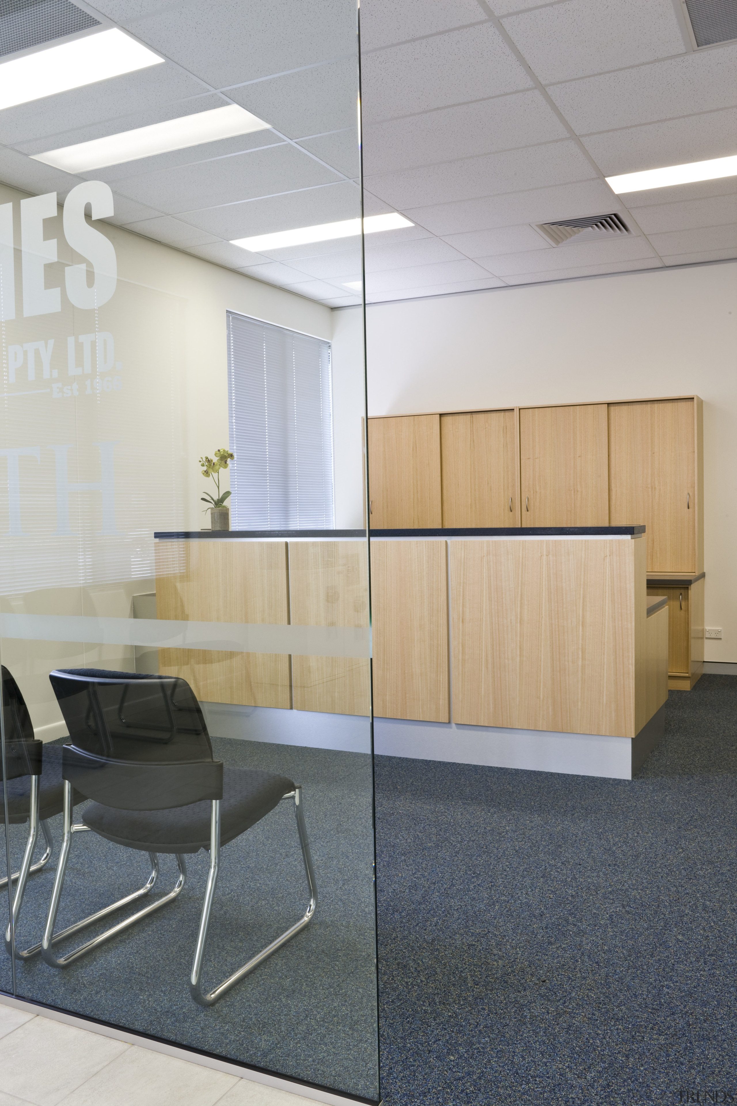 Image of desk and shelving supplied by The architecture, ceiling, floor, flooring, furniture, interior design, office, product design, table, wall, gray