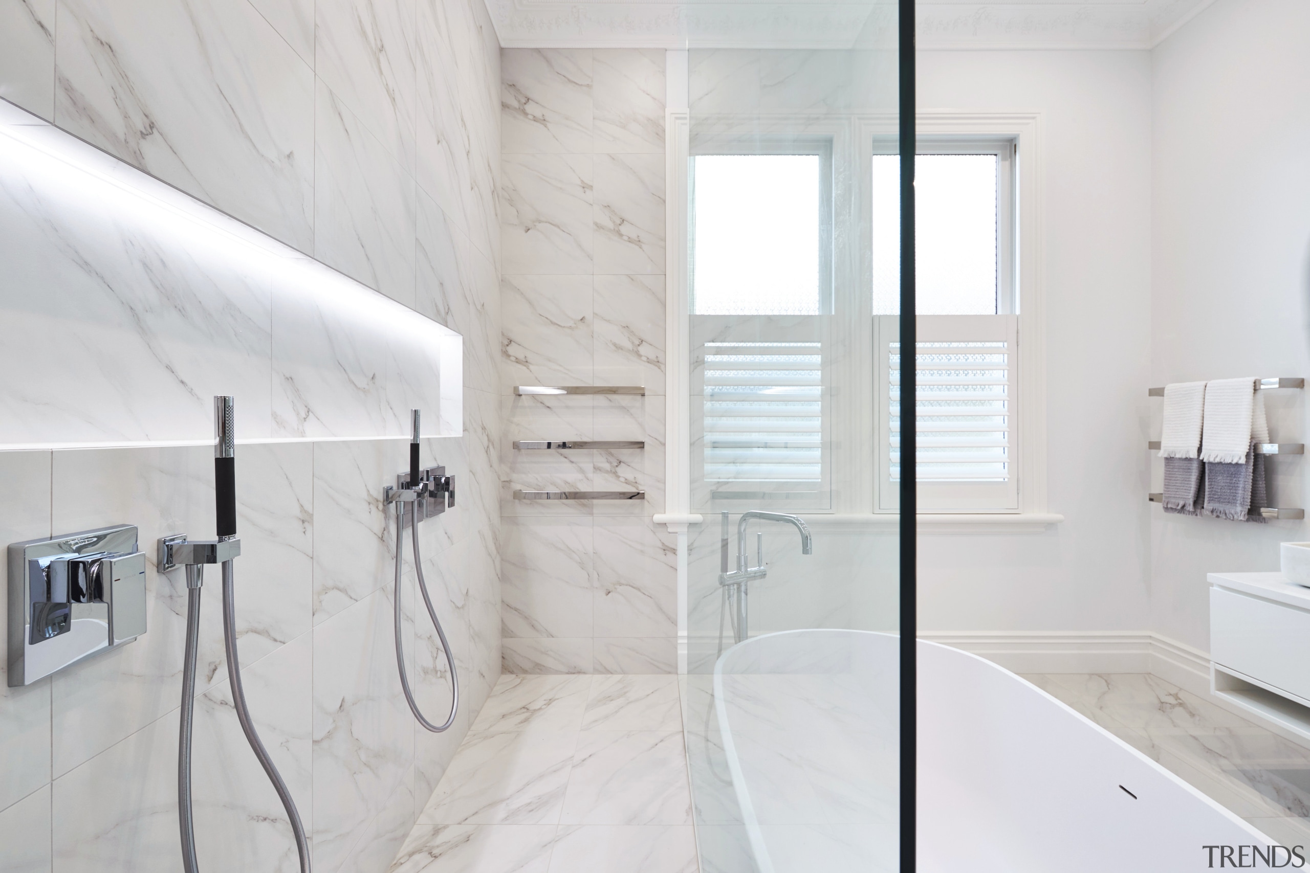 Uninterrupted swathes of marble-look porcelain tiles provide a architecture, bathroom, floor, flooring, home, interior design, product design, room, tap, tile, white