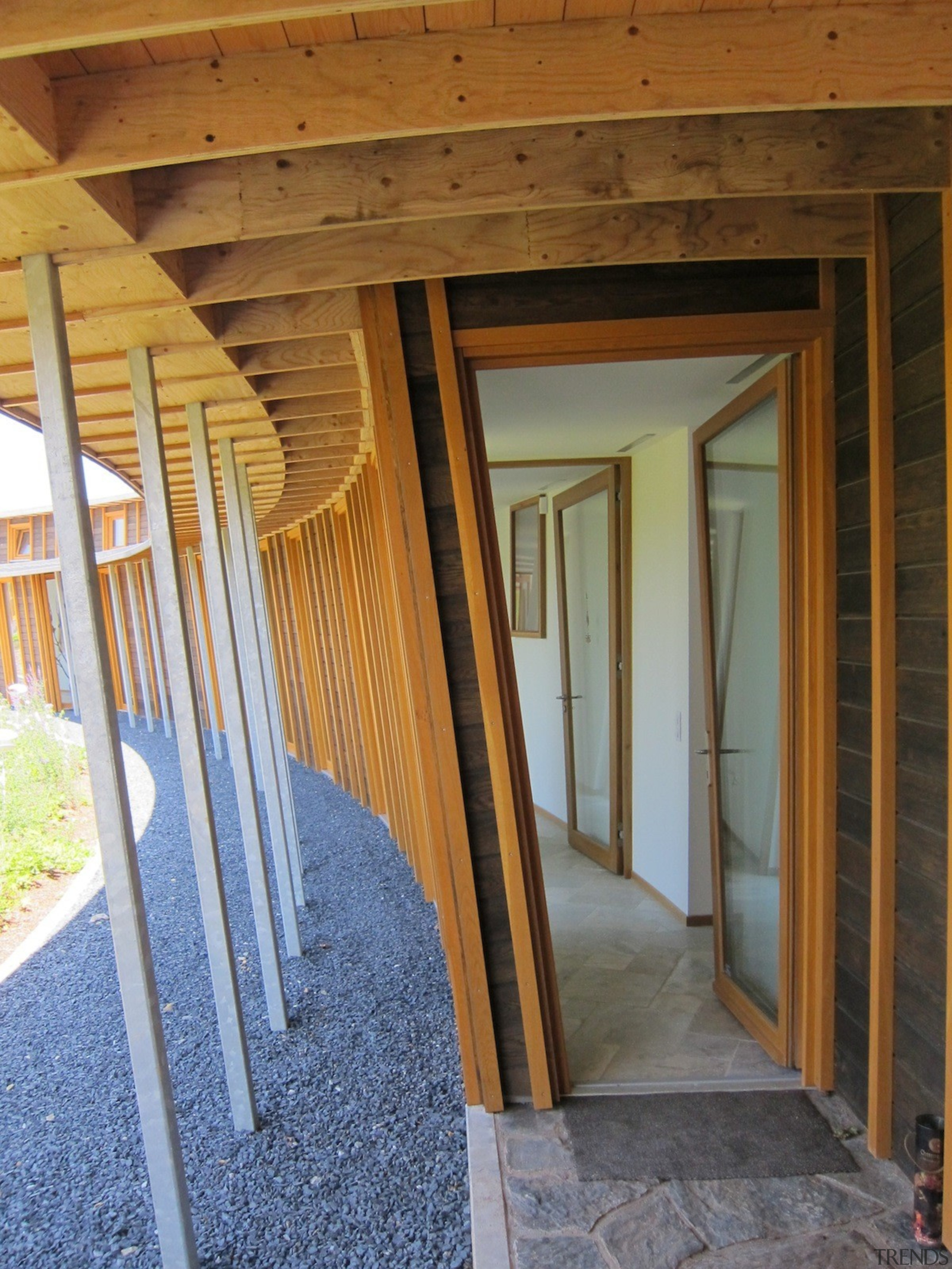 With sustainability and passive design rising high in beam, door, floor, handrail, home, house, real estate, stairs, structure, wall, window, wood, wood stain, brown