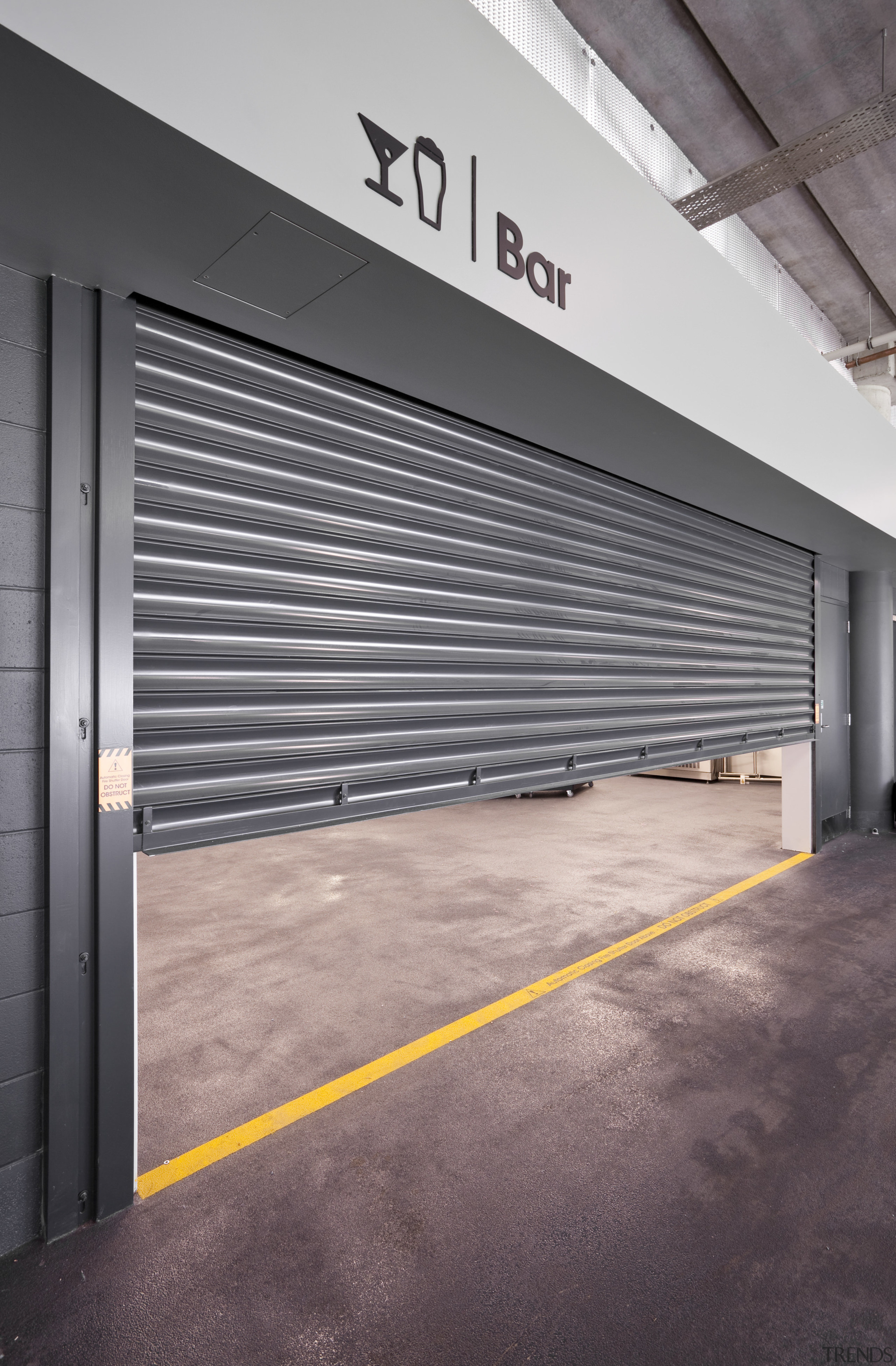 View of a metal roller door at the building, door, gray