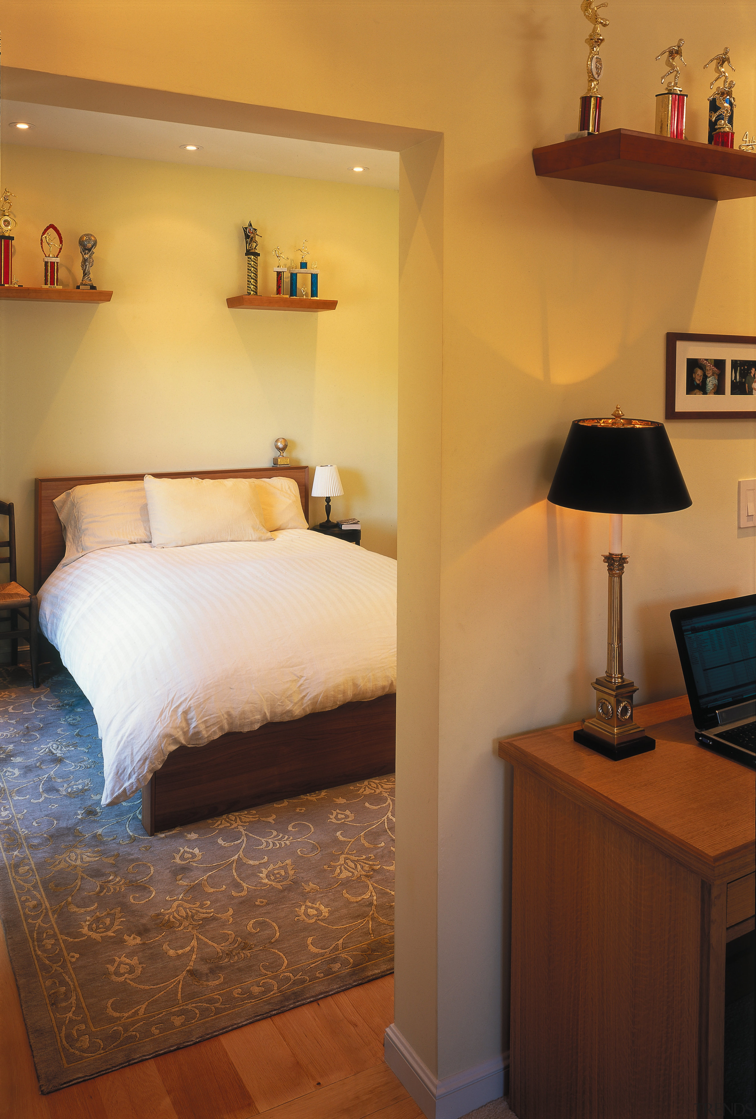 A view of a home by Hedgpeth Architects. bed, bed frame, bedroom, ceiling, floor, furniture, home, interior design, room, suite, wall, orange, brown