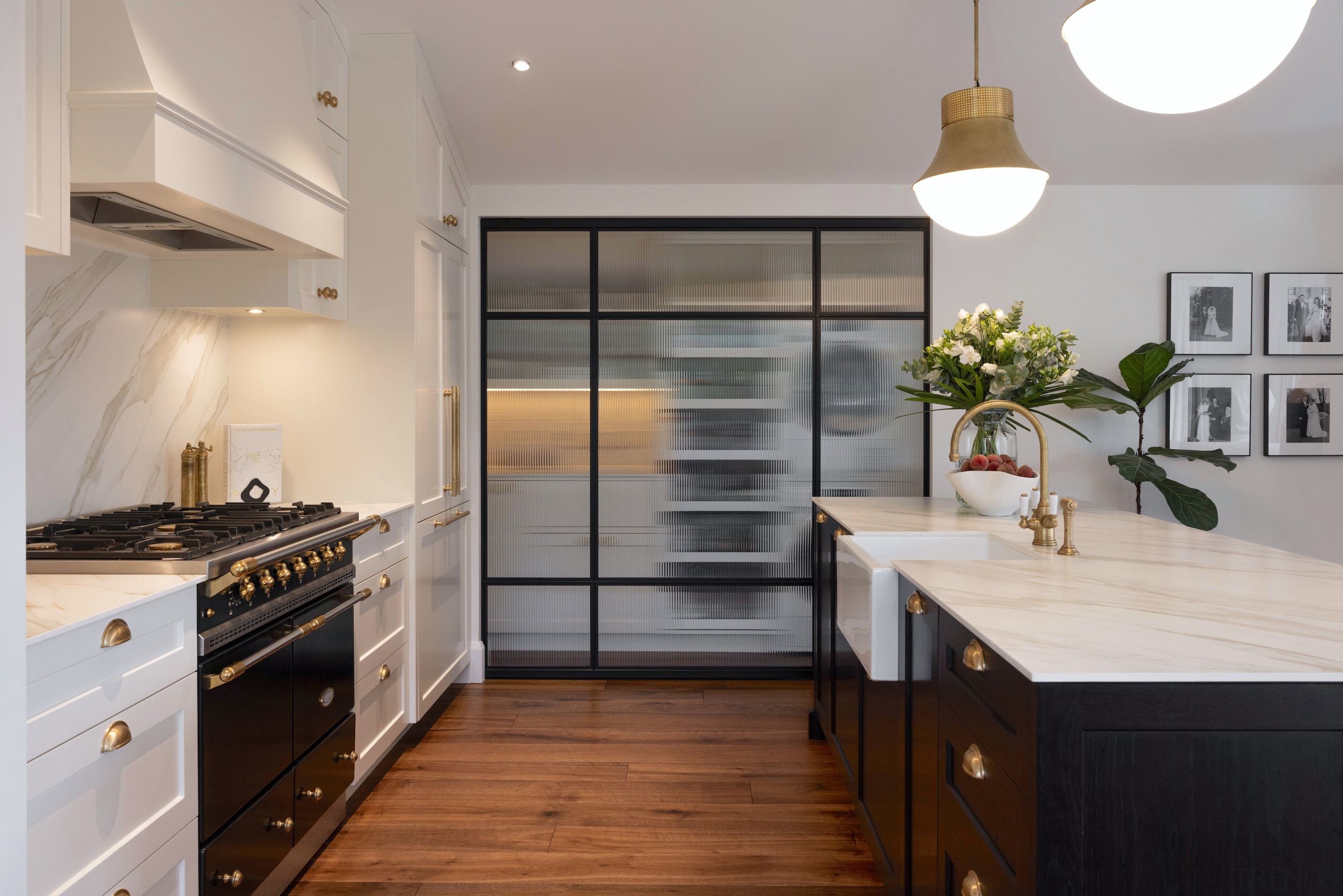 Looking across the kitchen to the reeded glass 