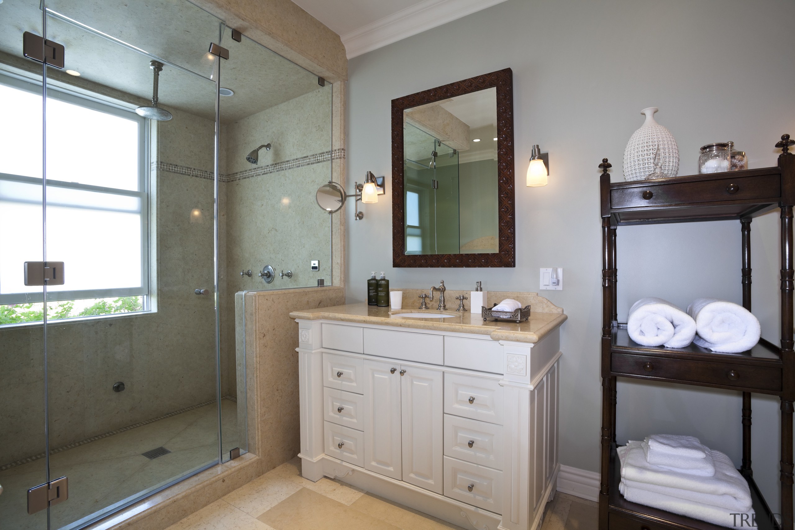 Interior view of this remodeled traditional condo by bathroom, bathroom accessory, bathroom cabinet, home, room, gray