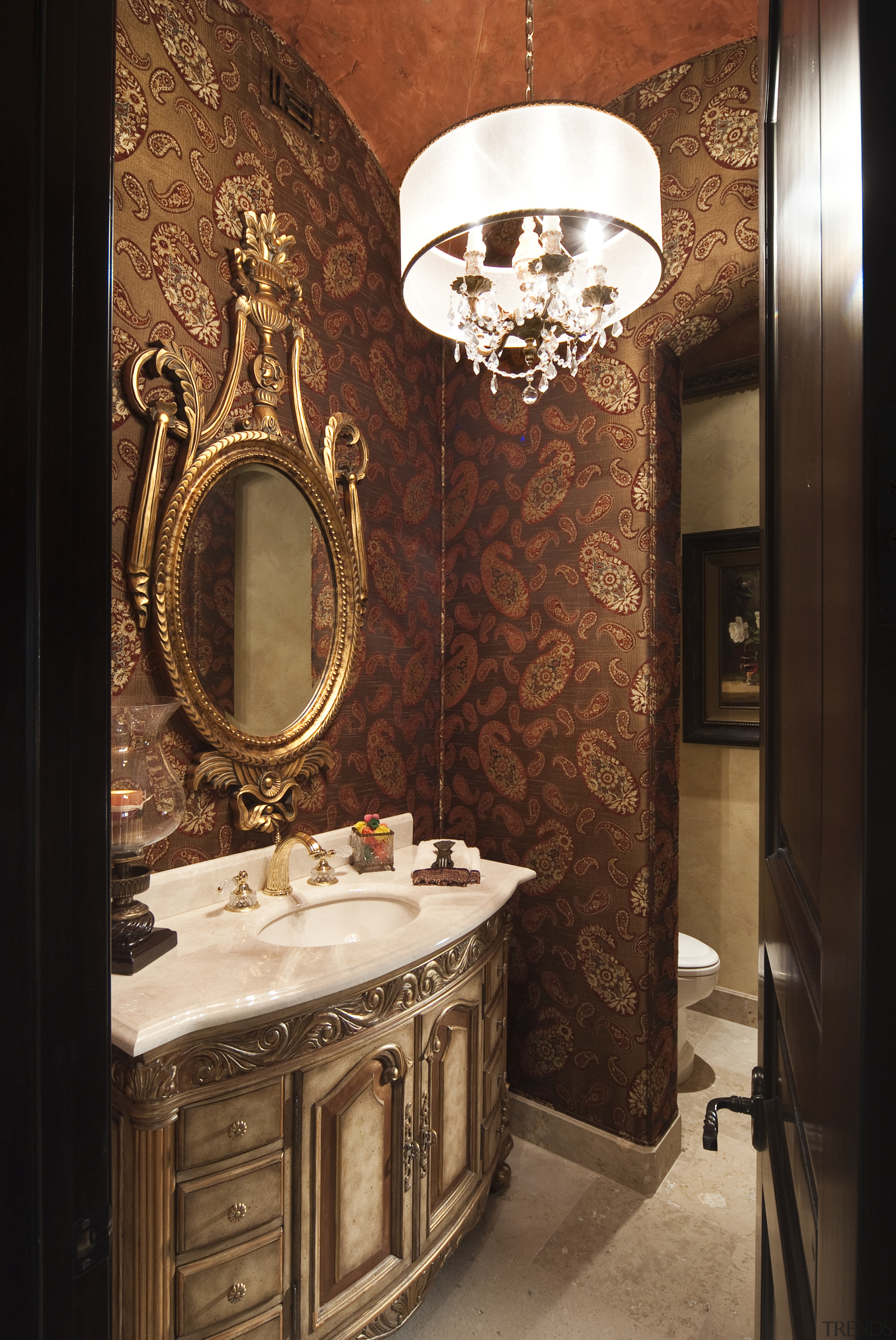 Bathroom vanity with ornate mirror and chandelier - bathroom, ceiling, interior design, room, wall, brown, black