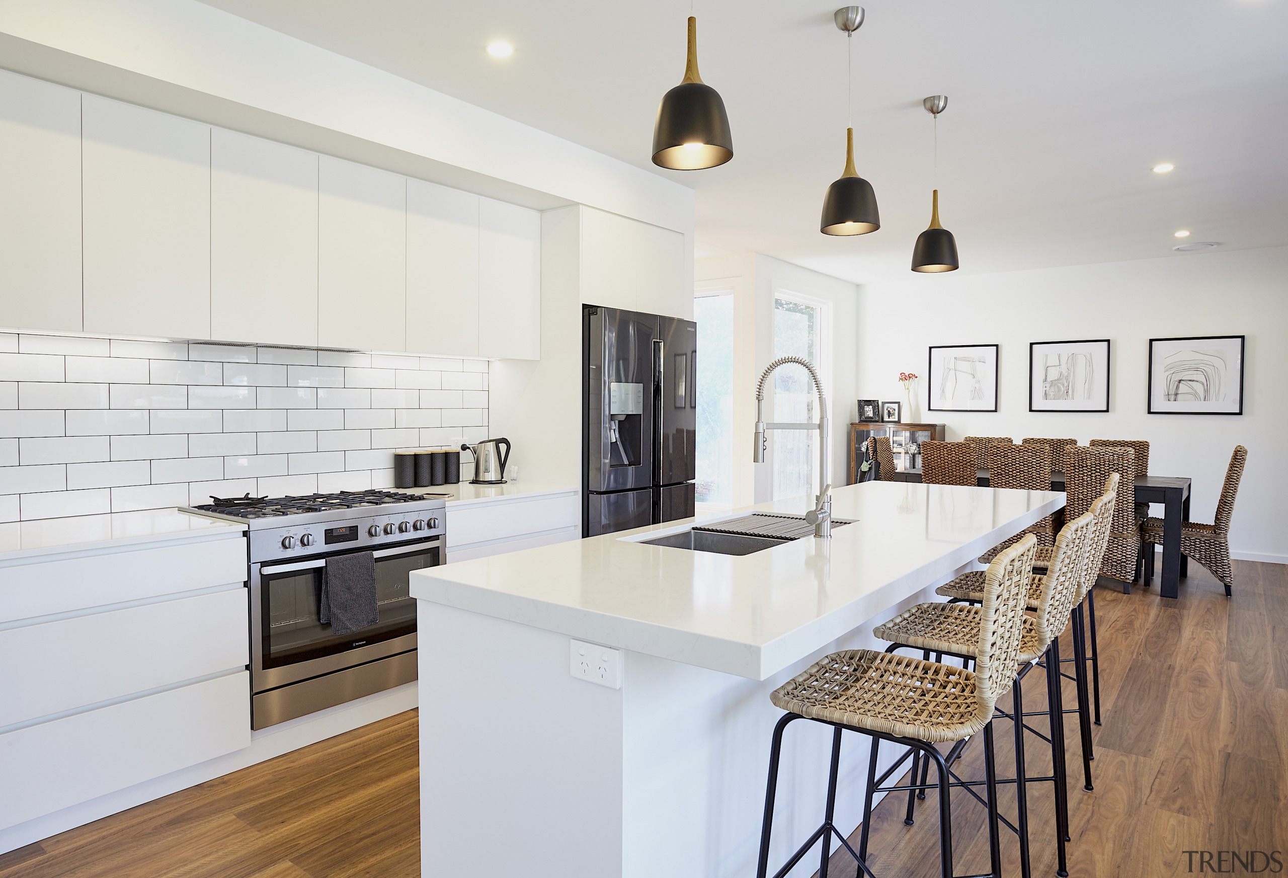 Crisp subway tiles form a classic splashback in 