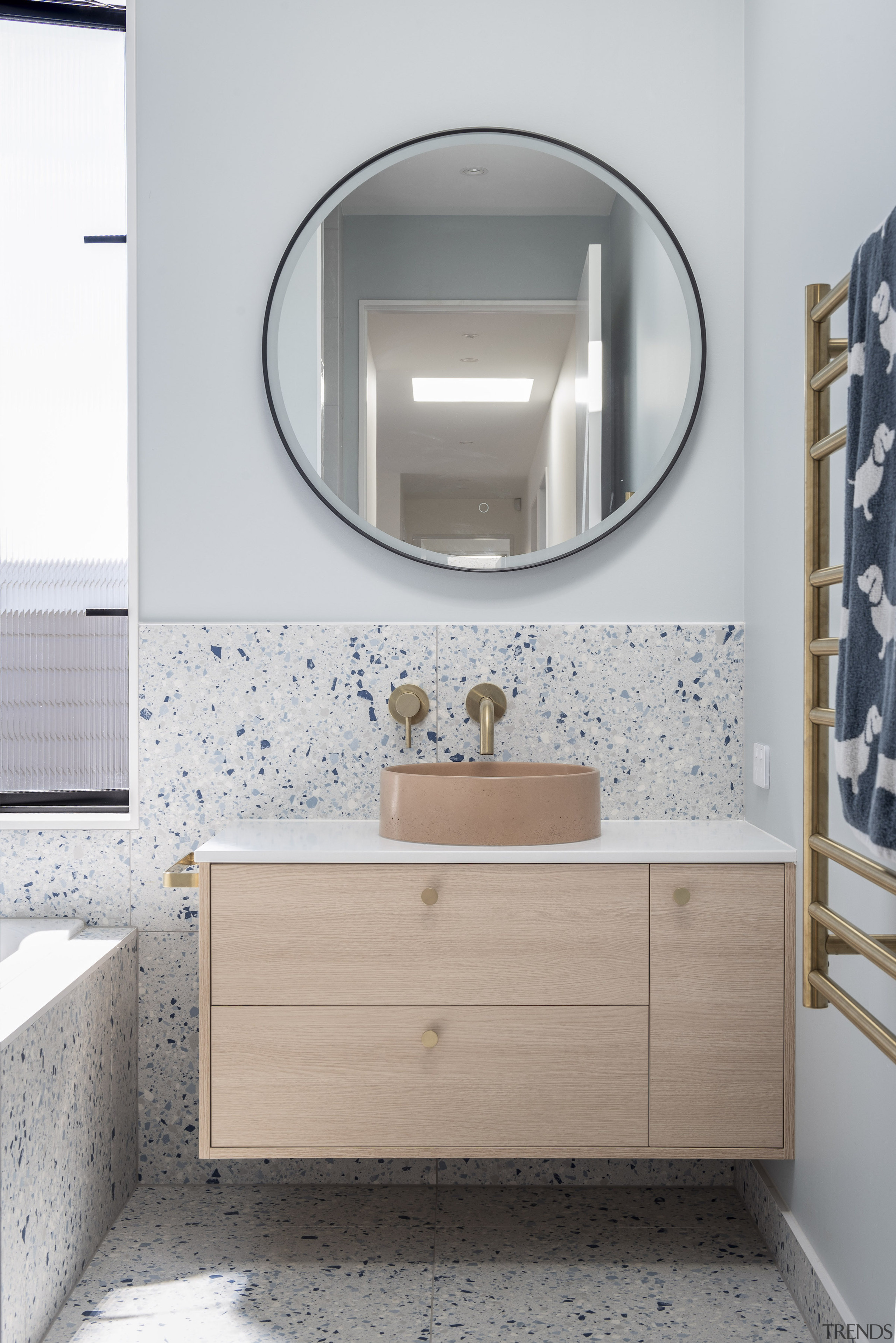 The children's/main bathroom with blue flecked terrazzo. 