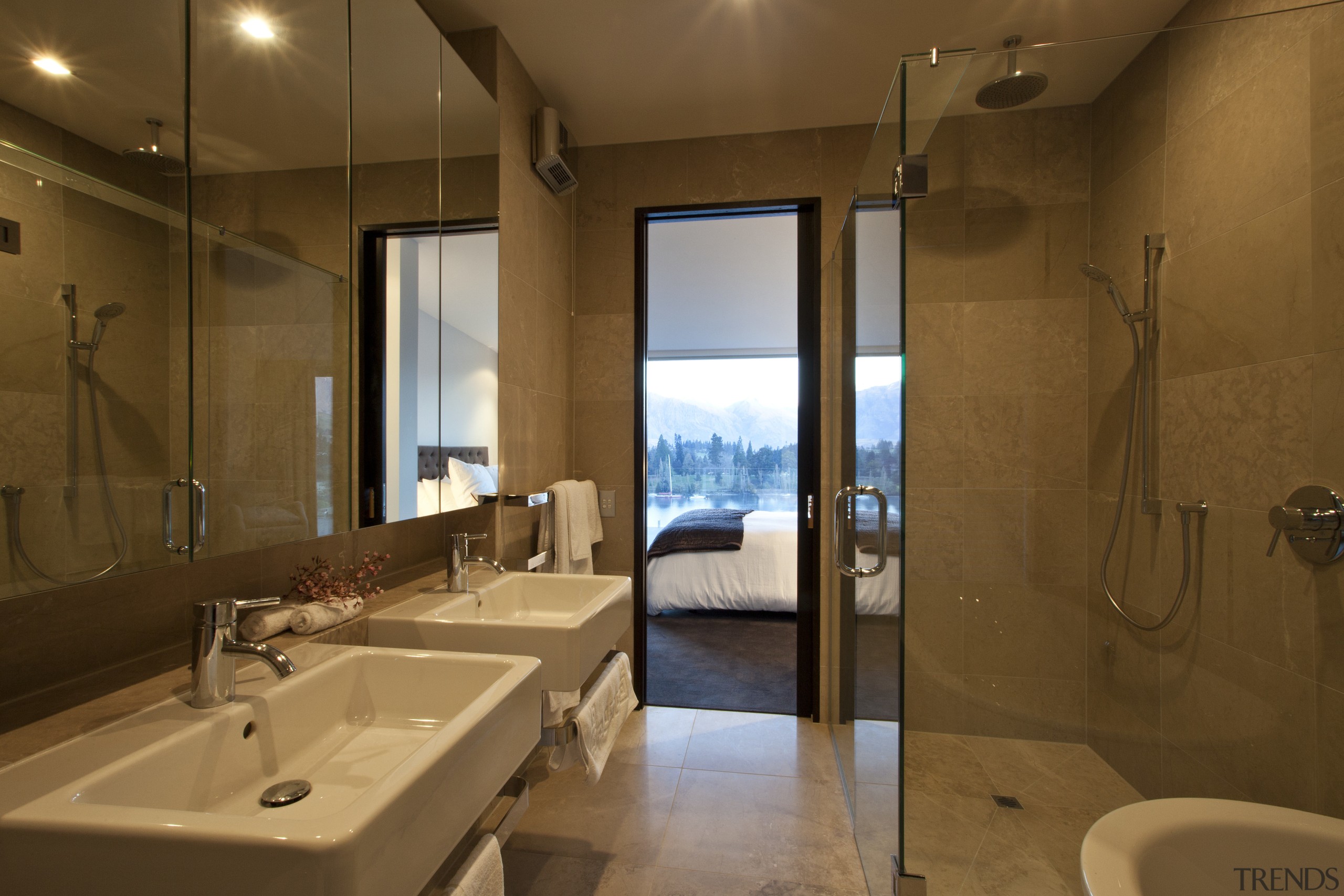 This home was designed by Allan Huntington of architecture, bathroom, estate, interior design, real estate, room, suite, brown