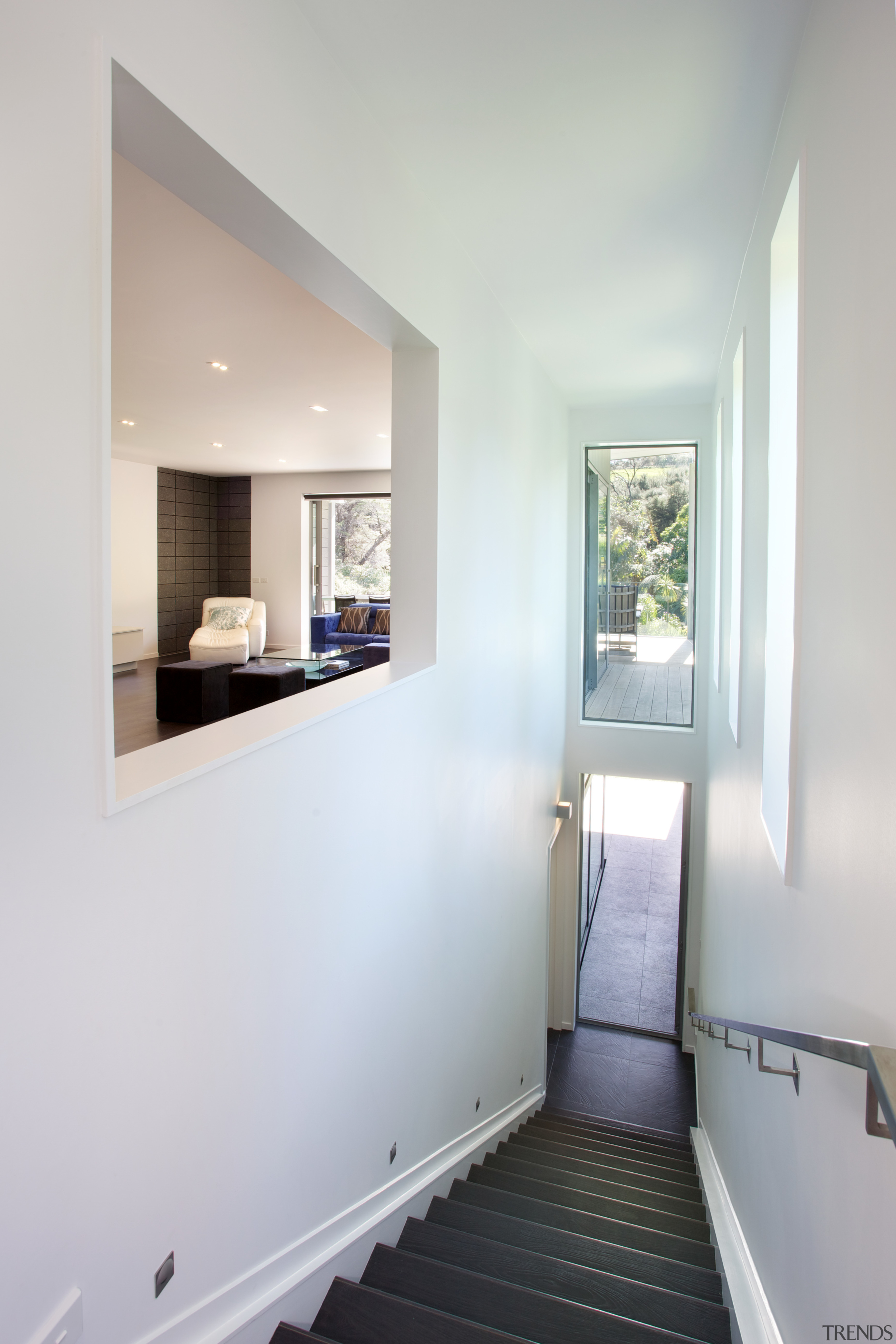 Stairs lead down to the master suite on architecture, home, house, room, gray