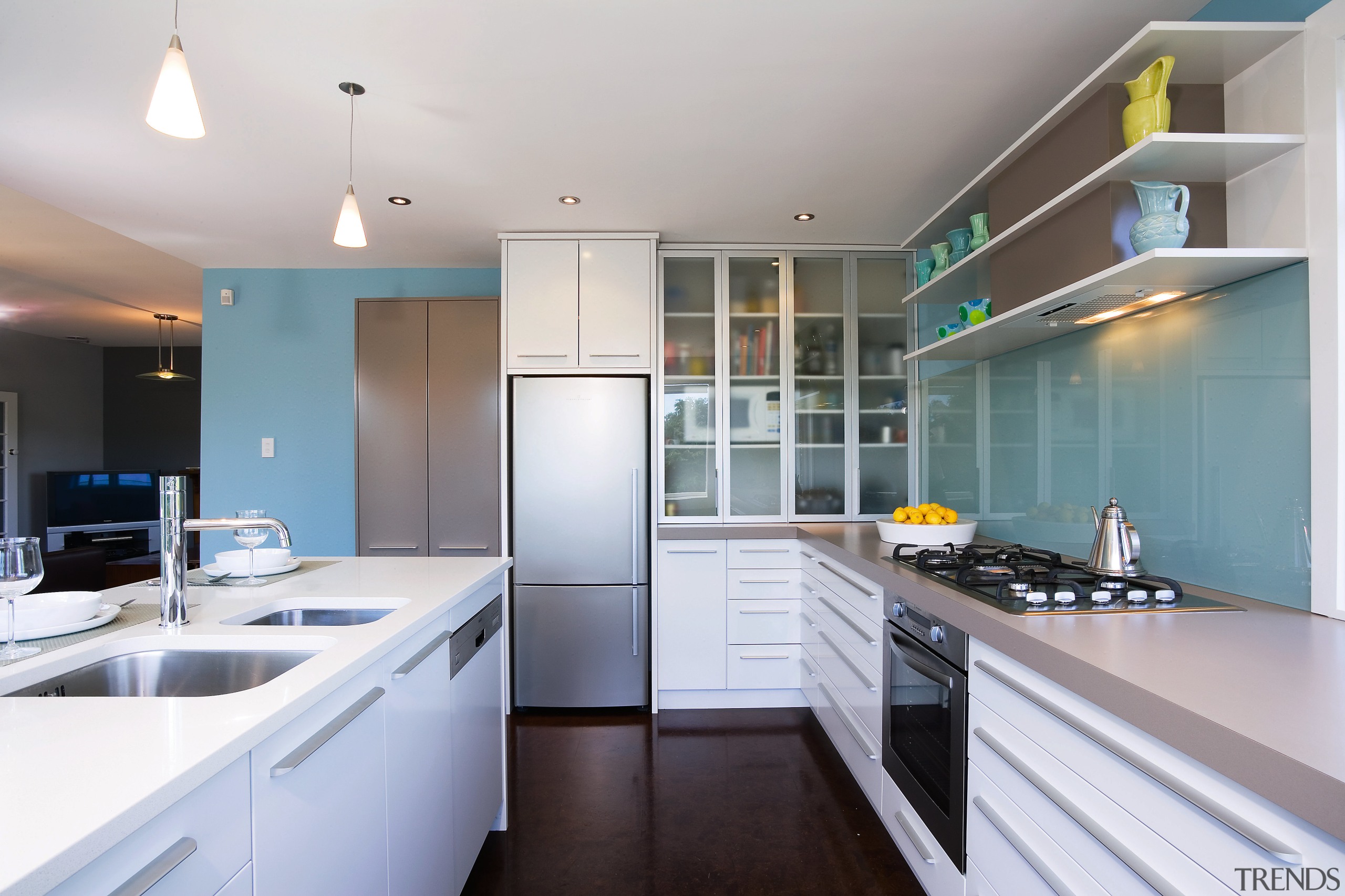 view of the kitchen featuring blum kitchen cabinetry, cabinetry, countertop, cuisine classique, interior design, kitchen, real estate, room, gray, white