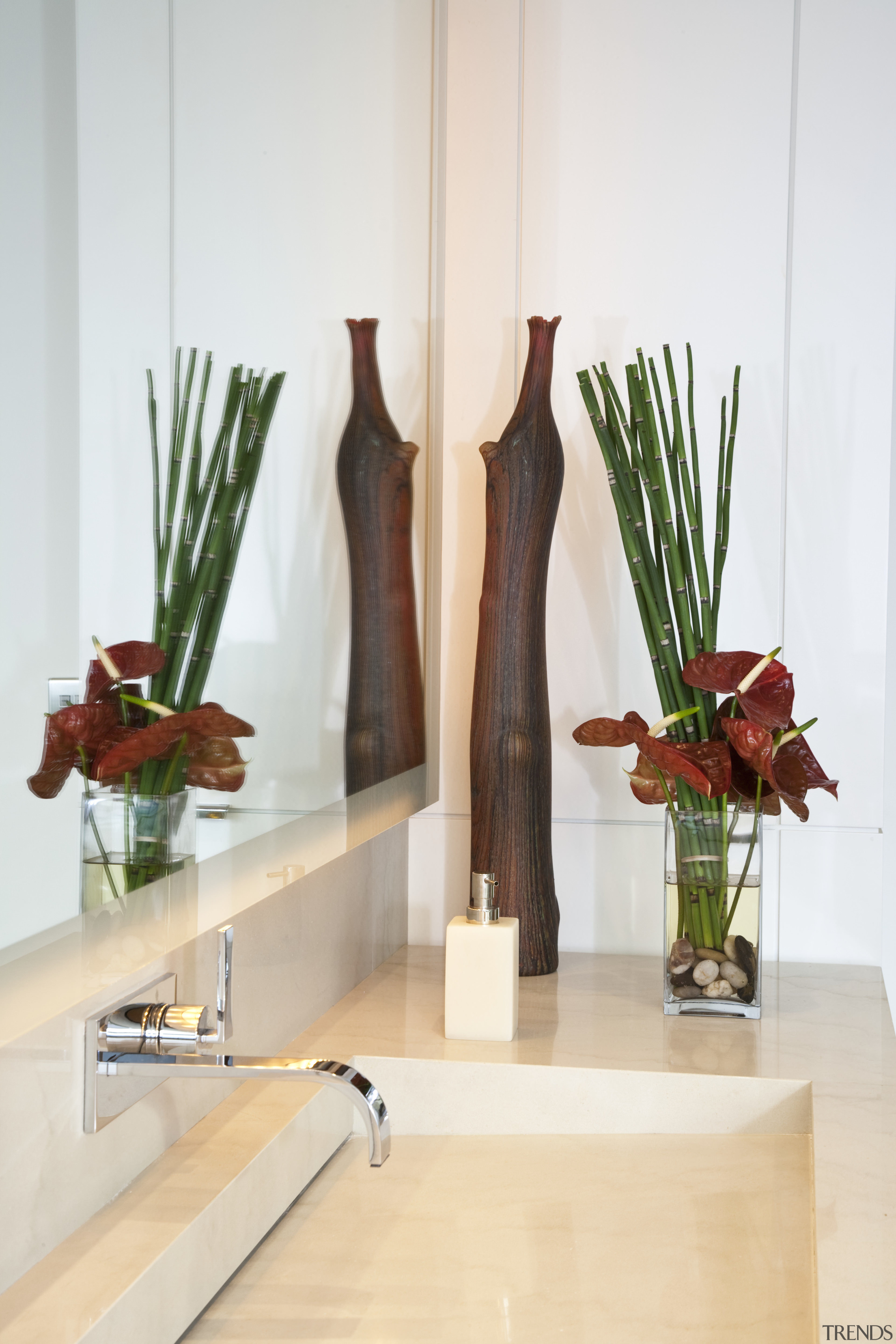 View of a bathroom which features vanity with floral design, floristry, flower, flower arranging, ikebana, interior design, product design, shelf, table, vase, wood, white