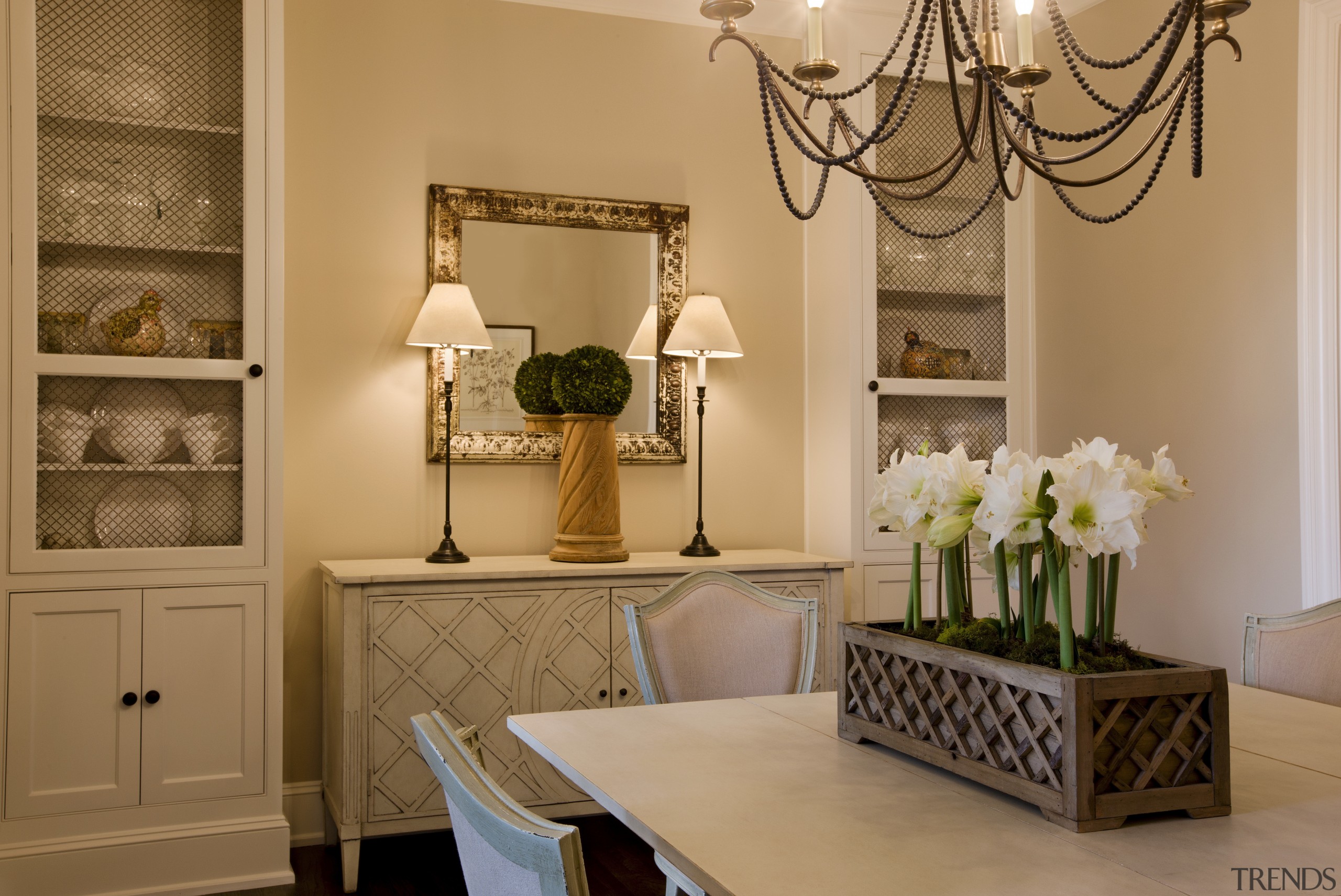 A steeply pitched gable roof and traditional detailing dining room, furniture, home, interior design, living room, room, table, wall, orange, brown