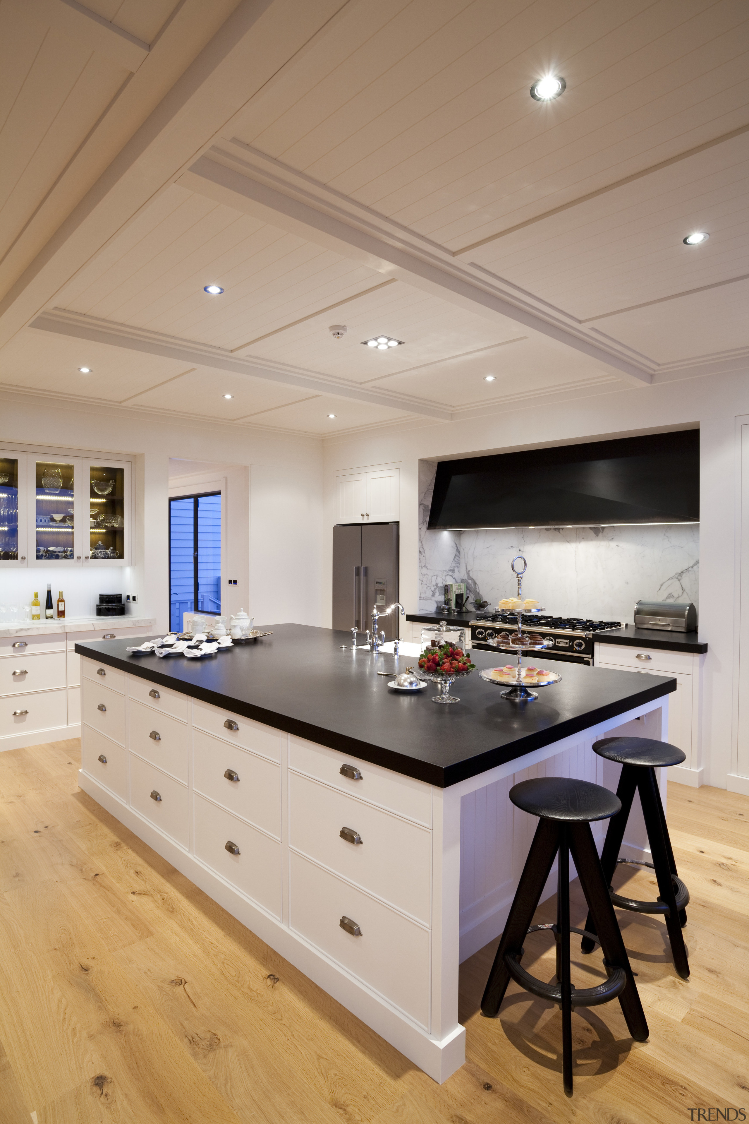 View of kitchen with wooden flooring, white cabinetry ceiling, countertop, cuisine classique, floor, flooring, interior design, kitchen, room, wood flooring, gray, orange