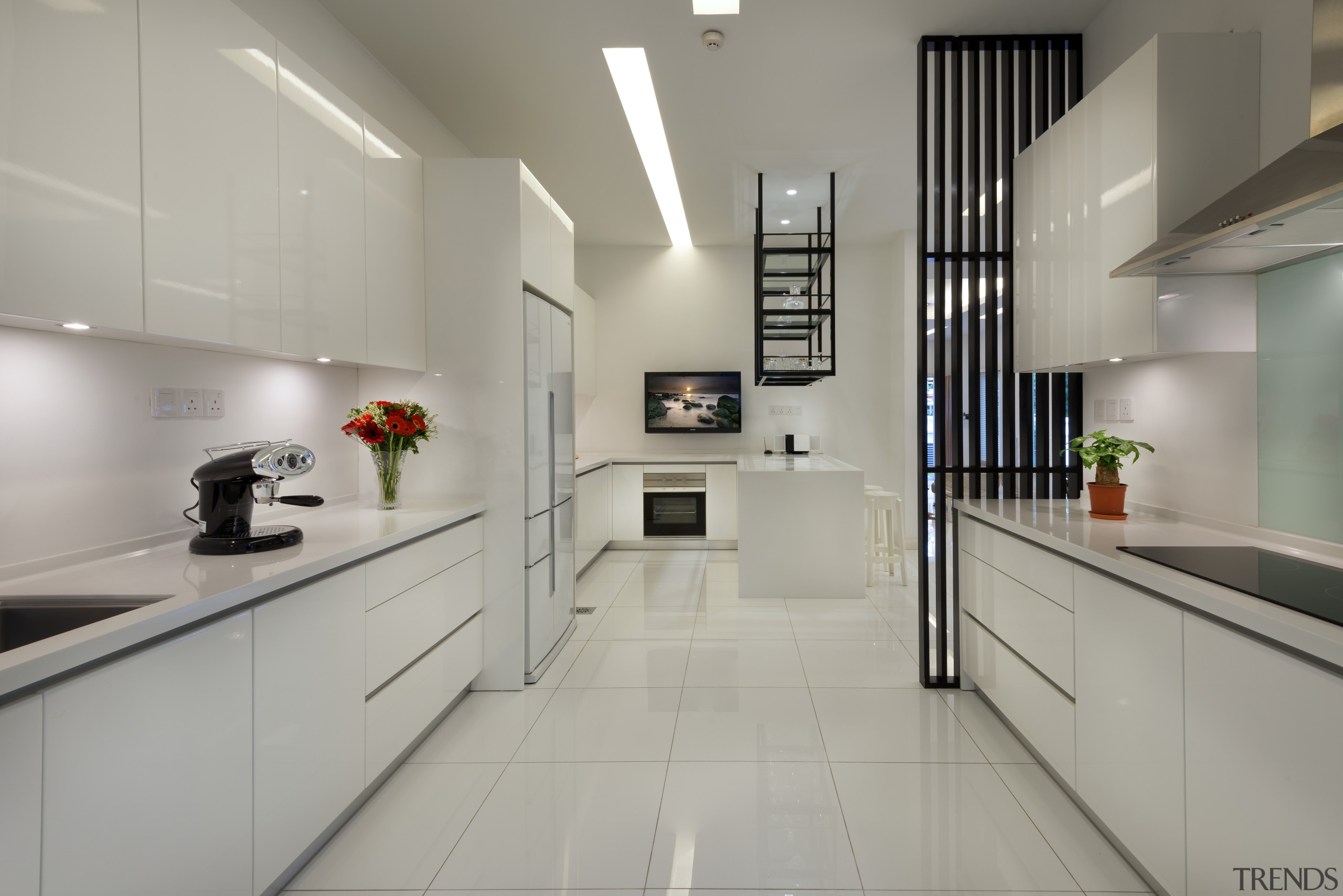 White townhouse kitchen with black contrasting elements, including countertop, cuisine classique, interior design, kitchen, real estate, room, gray
