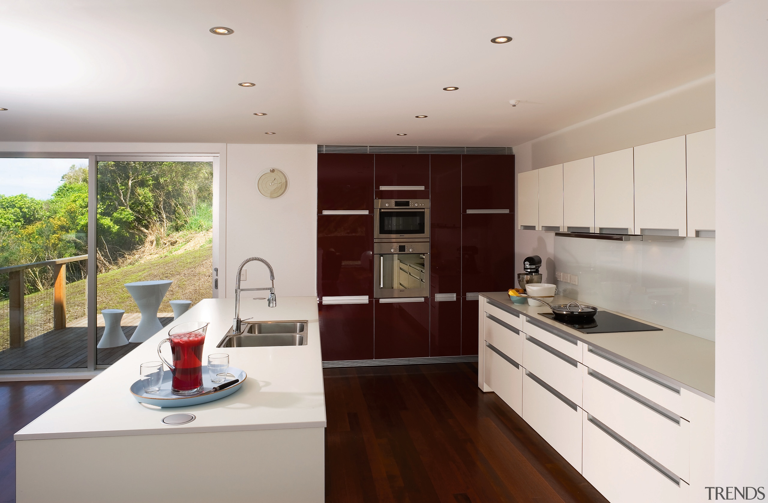 A view of a kitchen, cabinetry, glass benchtops, countertop, interior design, kitchen, property, real estate, gray