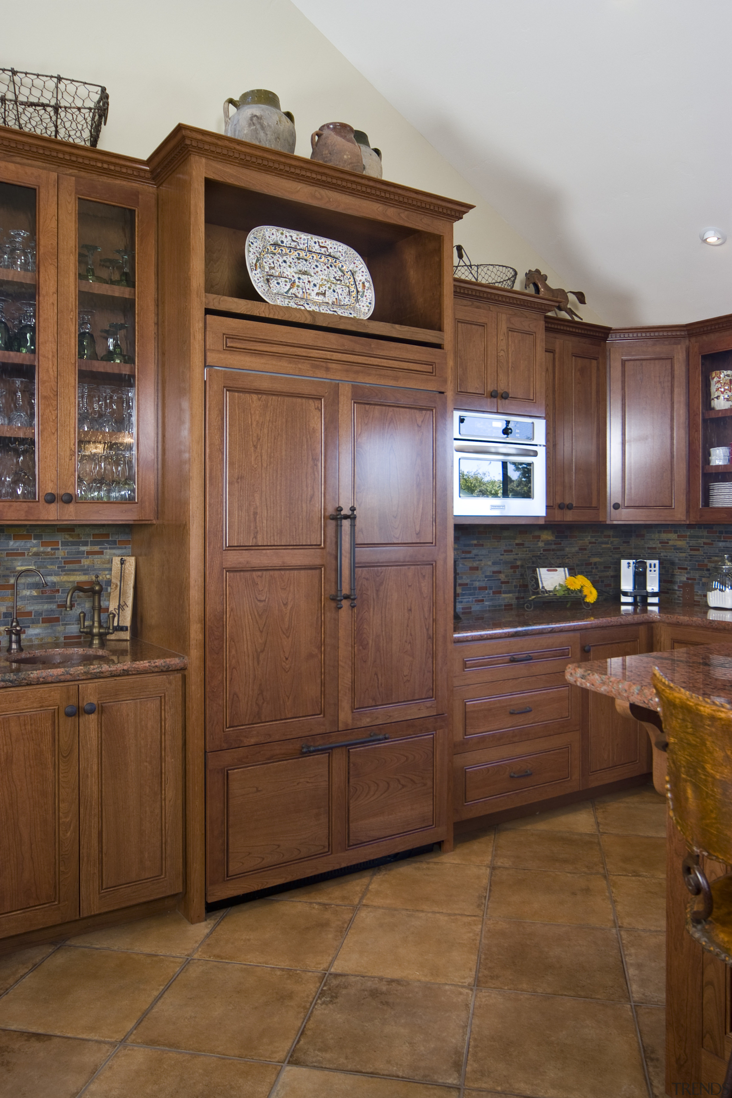 View of kitchen with wooden flooring and island cabinetry, countertop, cuisine classique, flooring, furniture, hardwood, interior design, kitchen, room, wood, wood stain, brown