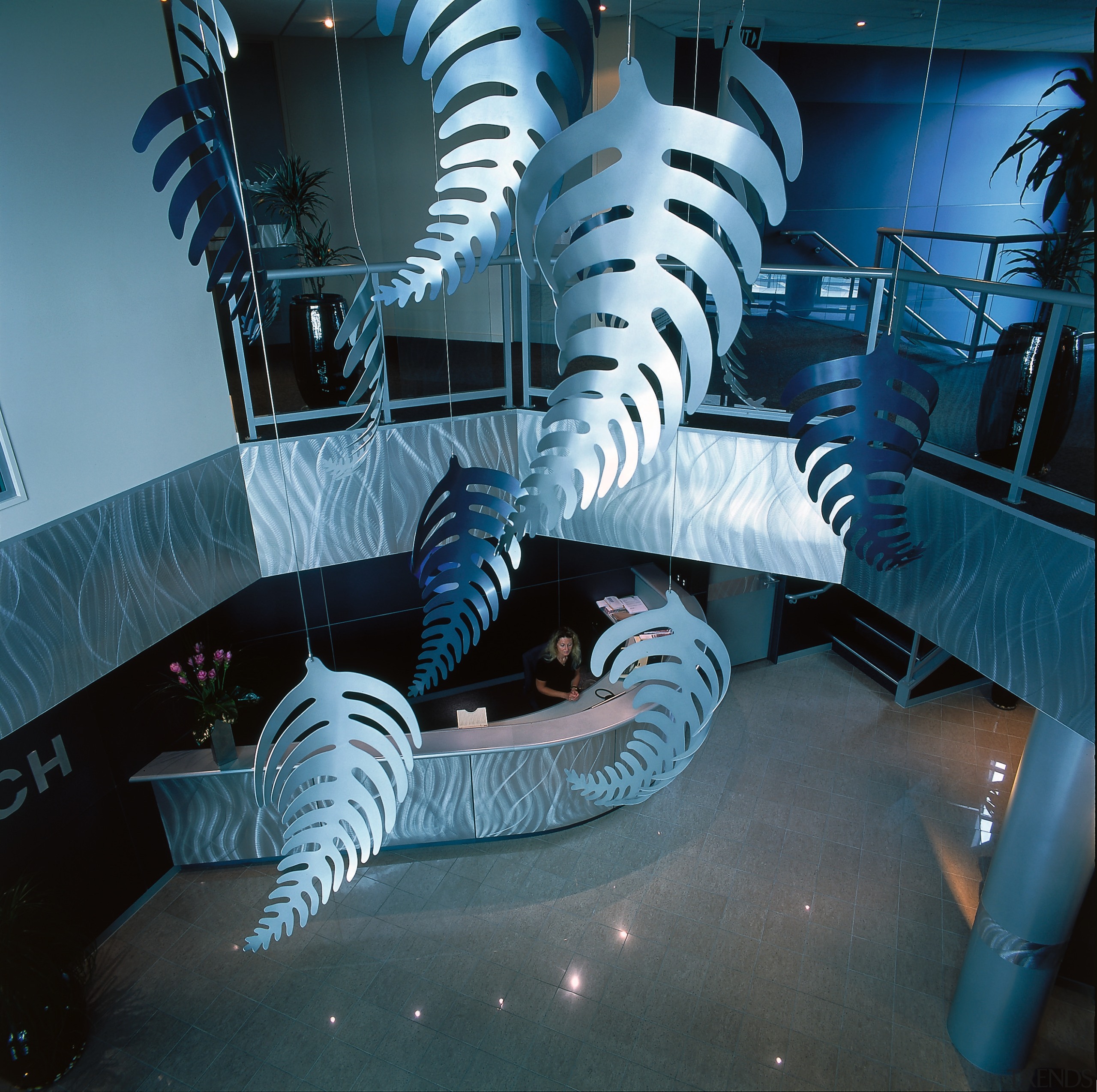 View of atrium looking down at reception area, tourist attraction, water, black, teal