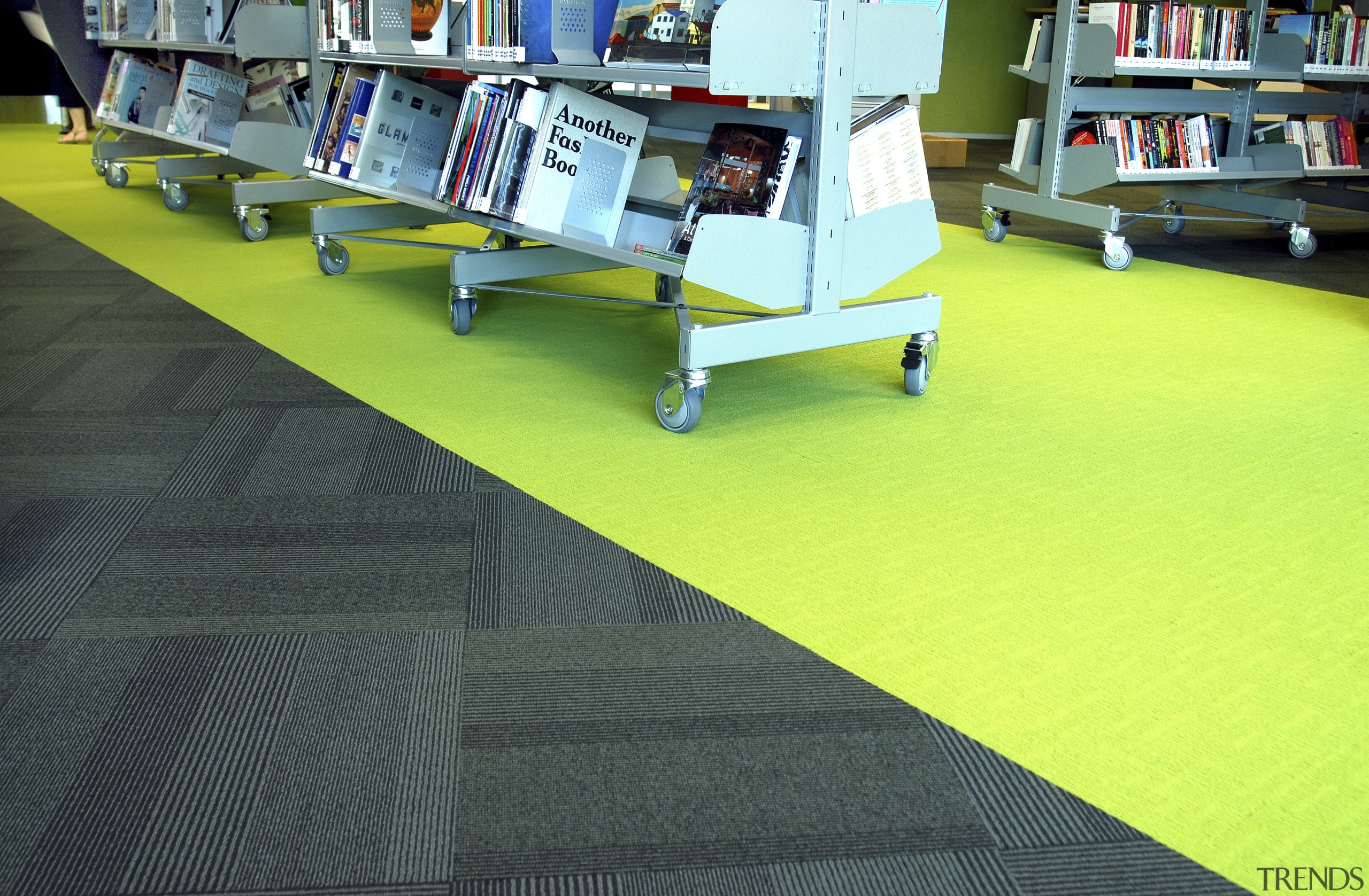 Close-up view of the interior carpet within this floor, flooring, green, sport venue, structure, yellow, yellow