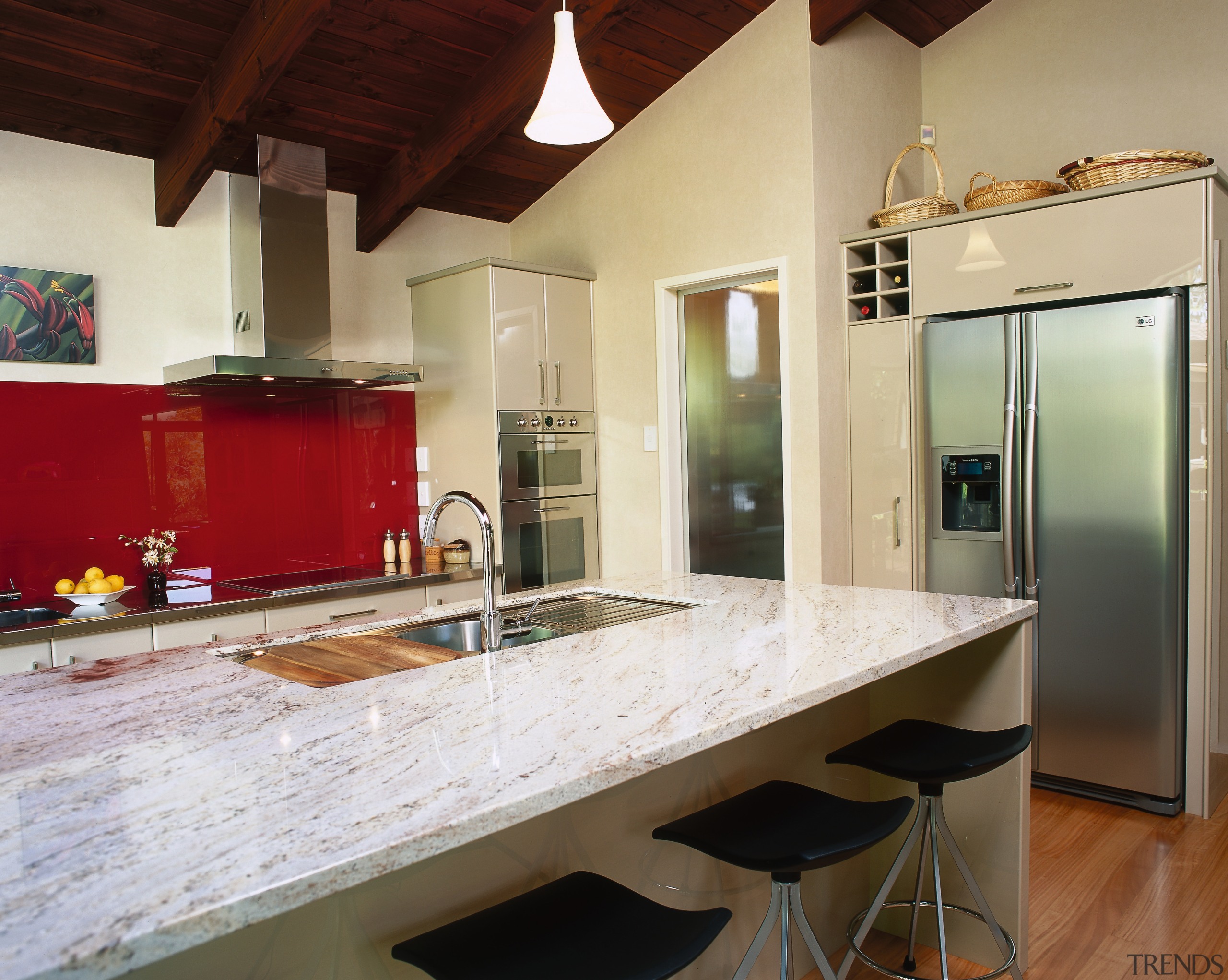 Kitchen with marble benchtop on island with sink, cabinetry, countertop, interior design, kitchen, real estate, room, brown