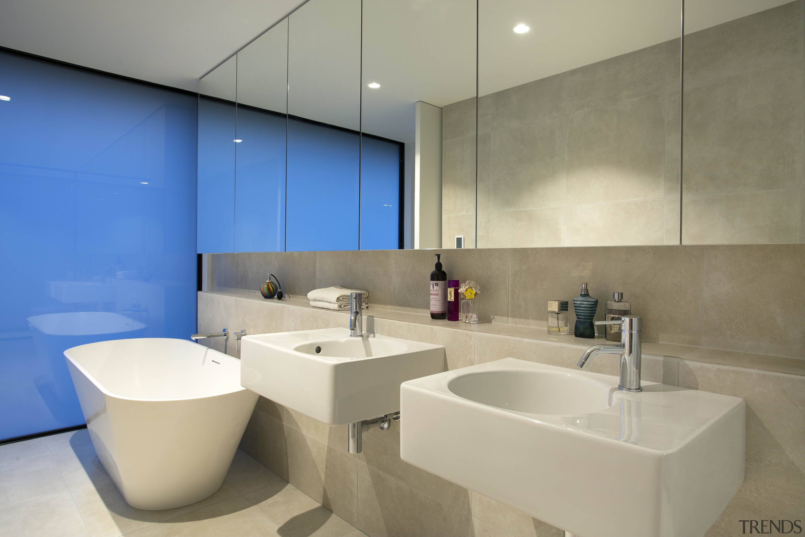 This minimalist bathroom achieves a sense of space architecture, bathroom, interior design, product design, room, sink, brown, orange